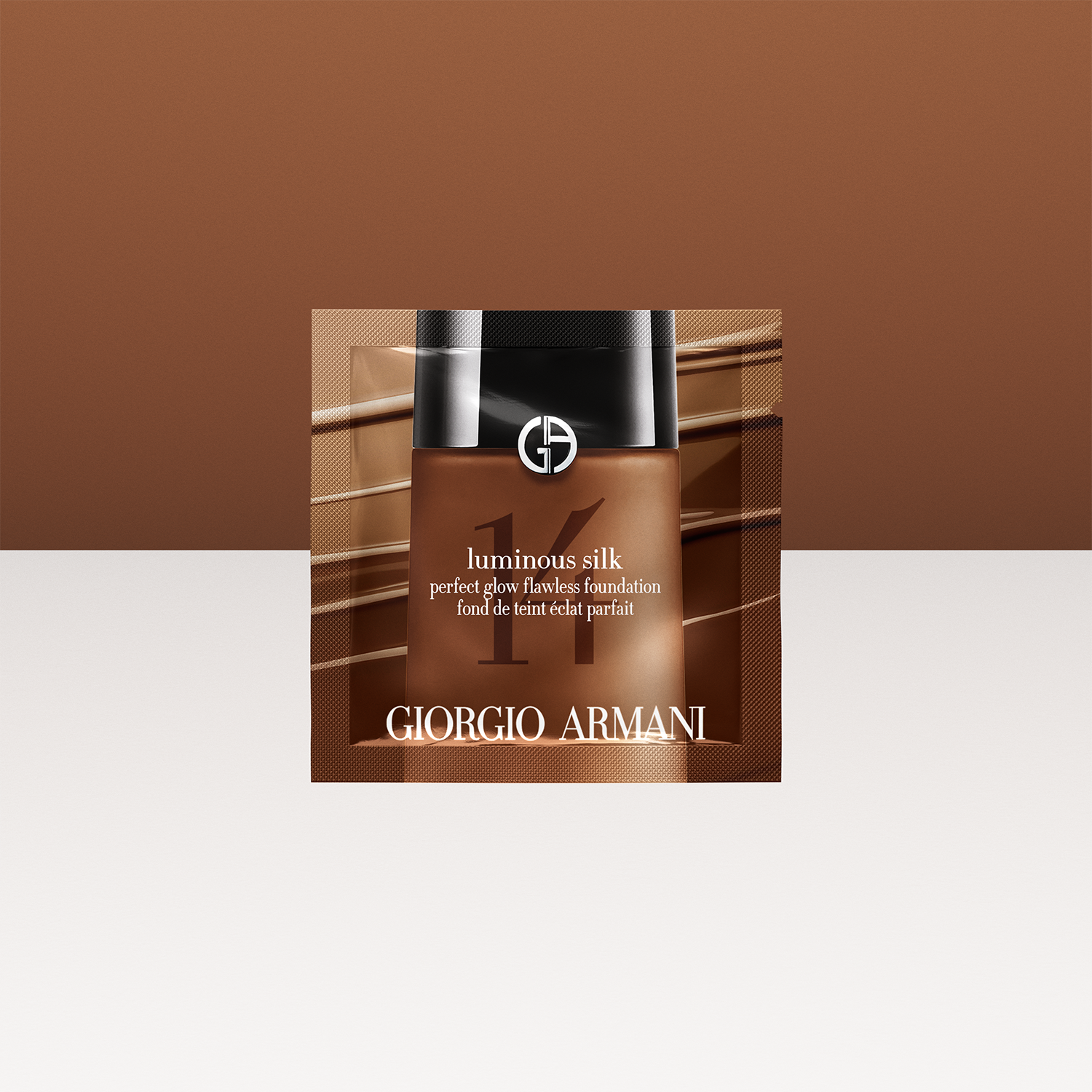 Giorgio Armani Luminous Silk foundation packaging with a brown and beige background. Packaging Design.