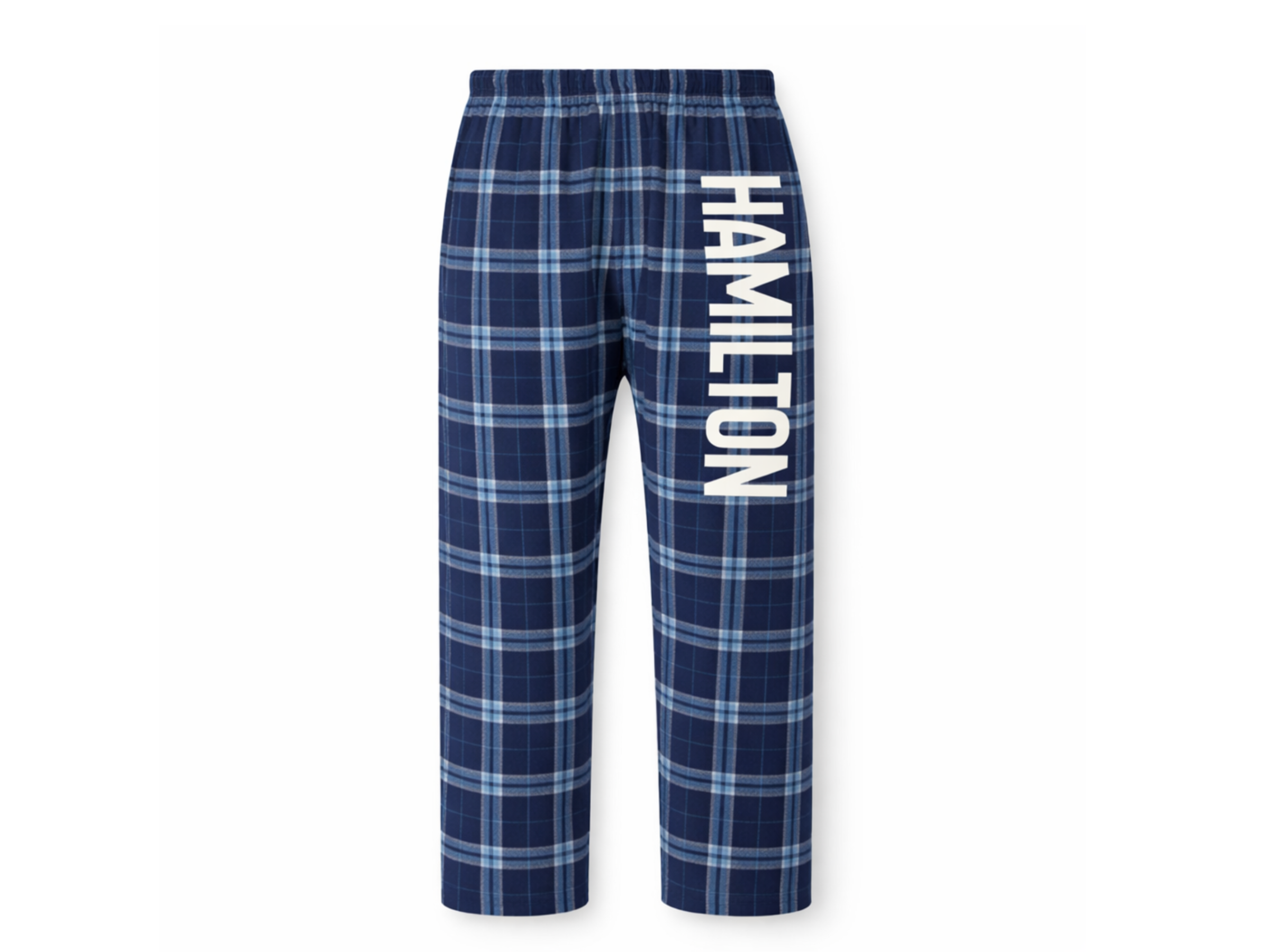 Pair of blue plaid pajama pants with the word "HAMILTON" written vertically in white letters on the left leg.