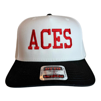 A white baseball cap with a black brim and red embroidered letters 'ACES' on the front. 