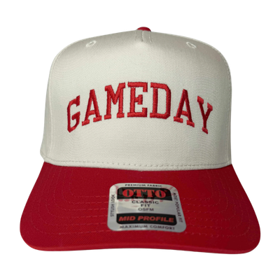 Cream and red trucker hat with the word 'GAMEDAY' embroidered in red on the front.
