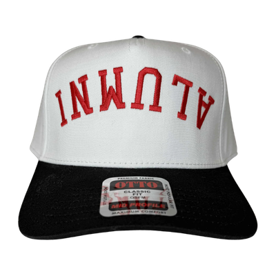 A white and black trucker hat with 'ALUMNI' embroidered in red upside down.