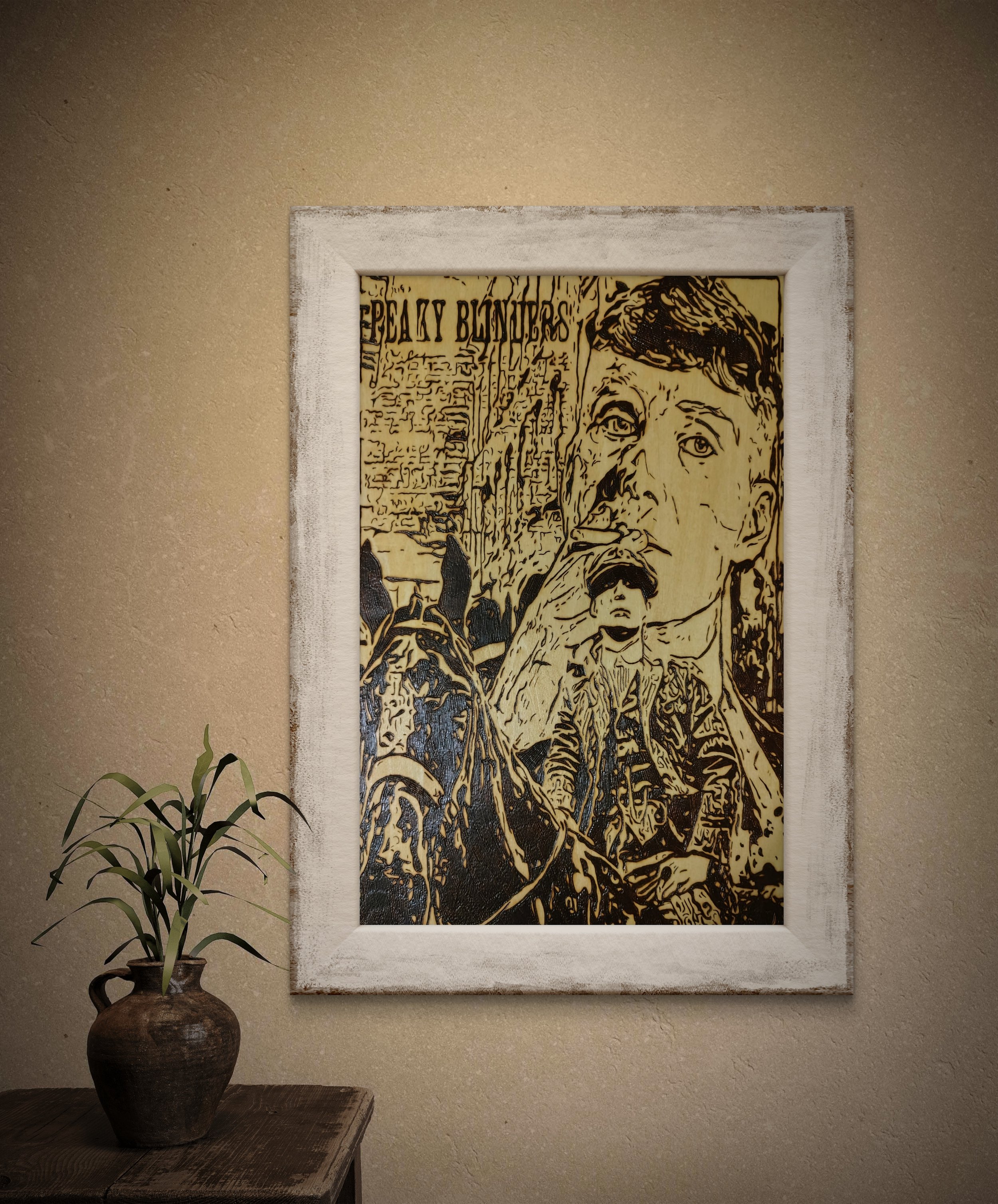 Close-up view of hand-burned basswood art inspired by Peaky Blinders, highlighting detailed line work, texture, and contrast.