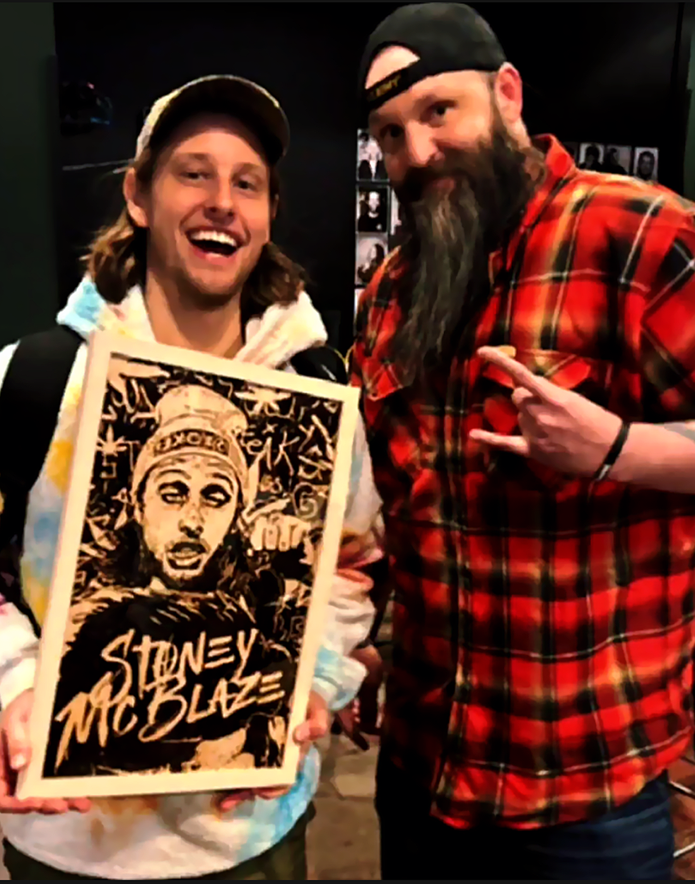 Custom wood-burned portrait of comedian Stoney McBlaze held by the subject, featuring expressive handcrafted pyrography with bold linework, urban influence, and character-driven wood burning artwork