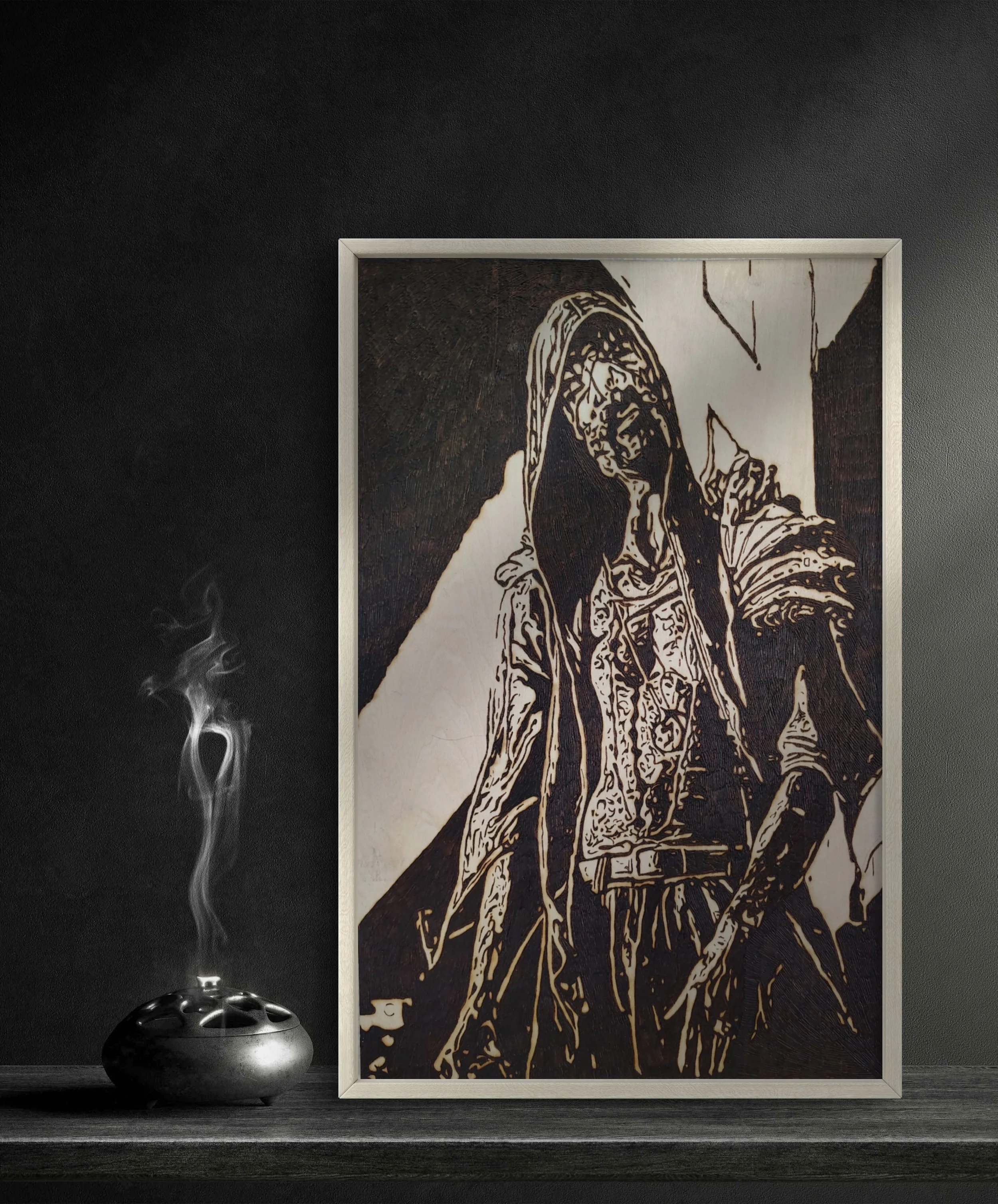 Original wood burning and pyrography artwork depicting a cloaked figure, burned by hand into basswood with deep shadows and textured line detail