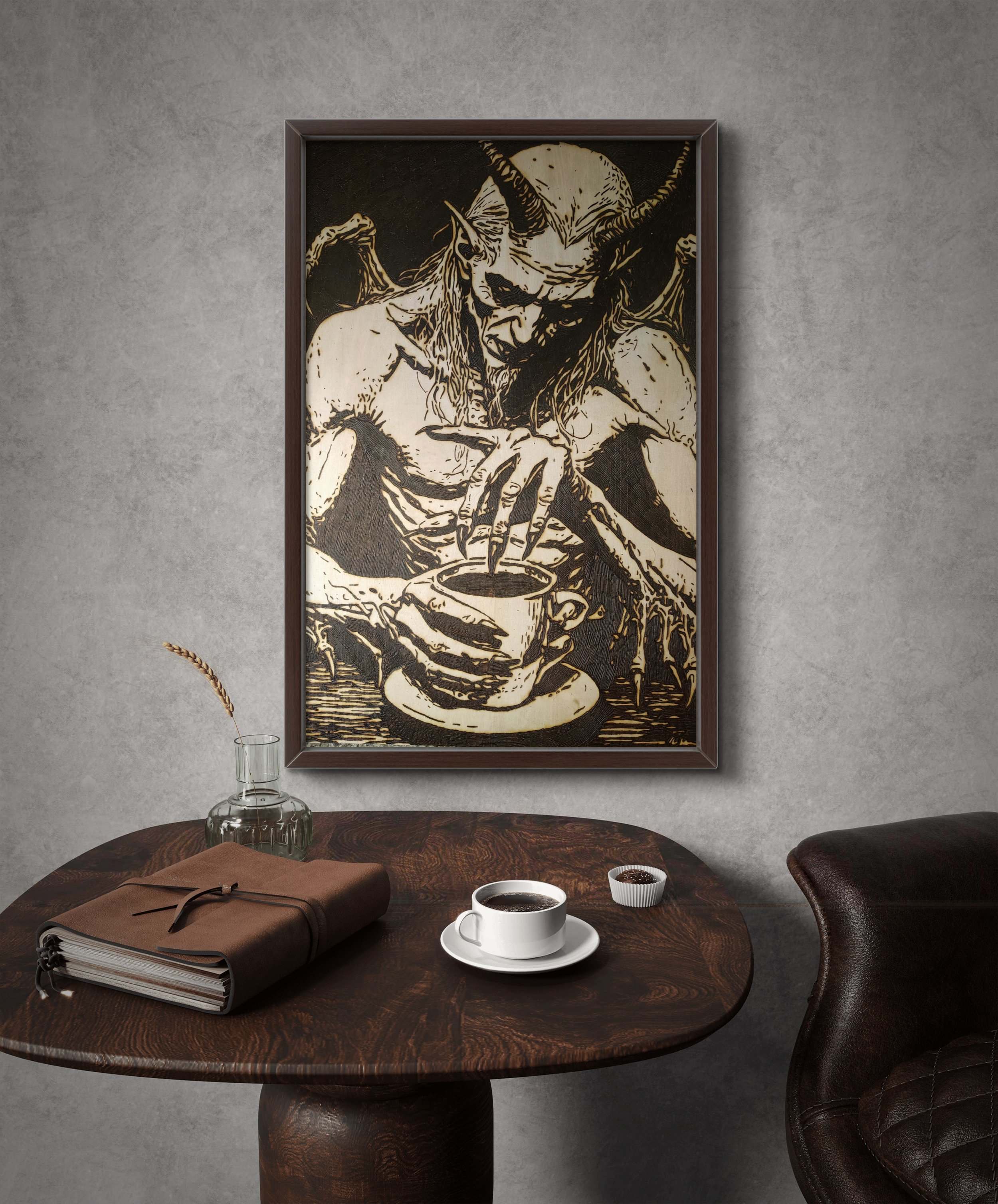 Original wood burning and pyrography wall art depicting a horned figure drinking from a cup, burned by hand into basswood and displayed in a framed interior environment