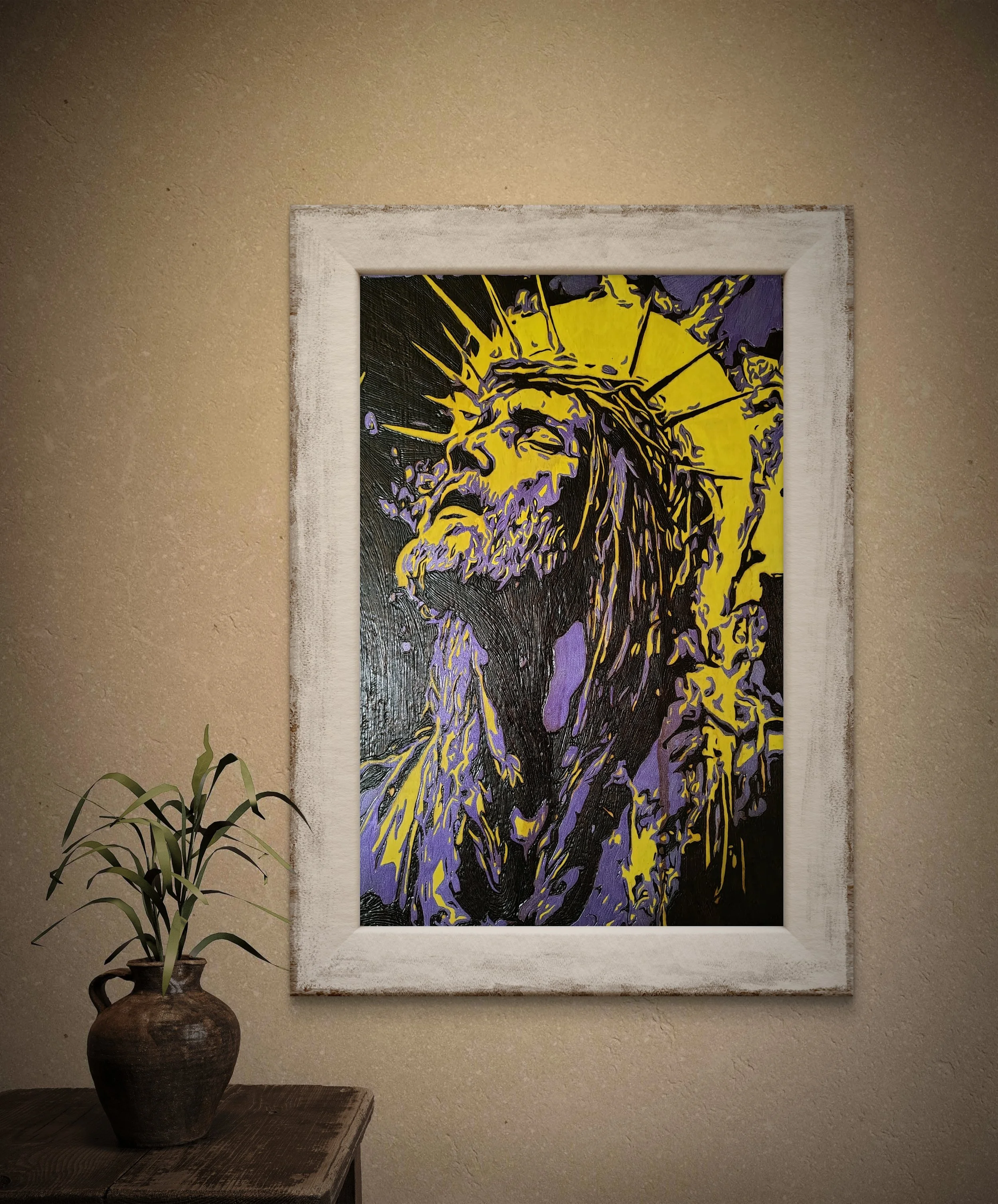 Close-up view of detailed wood-burned and painted wall art featuring expressive facial texture and layered color on basswood