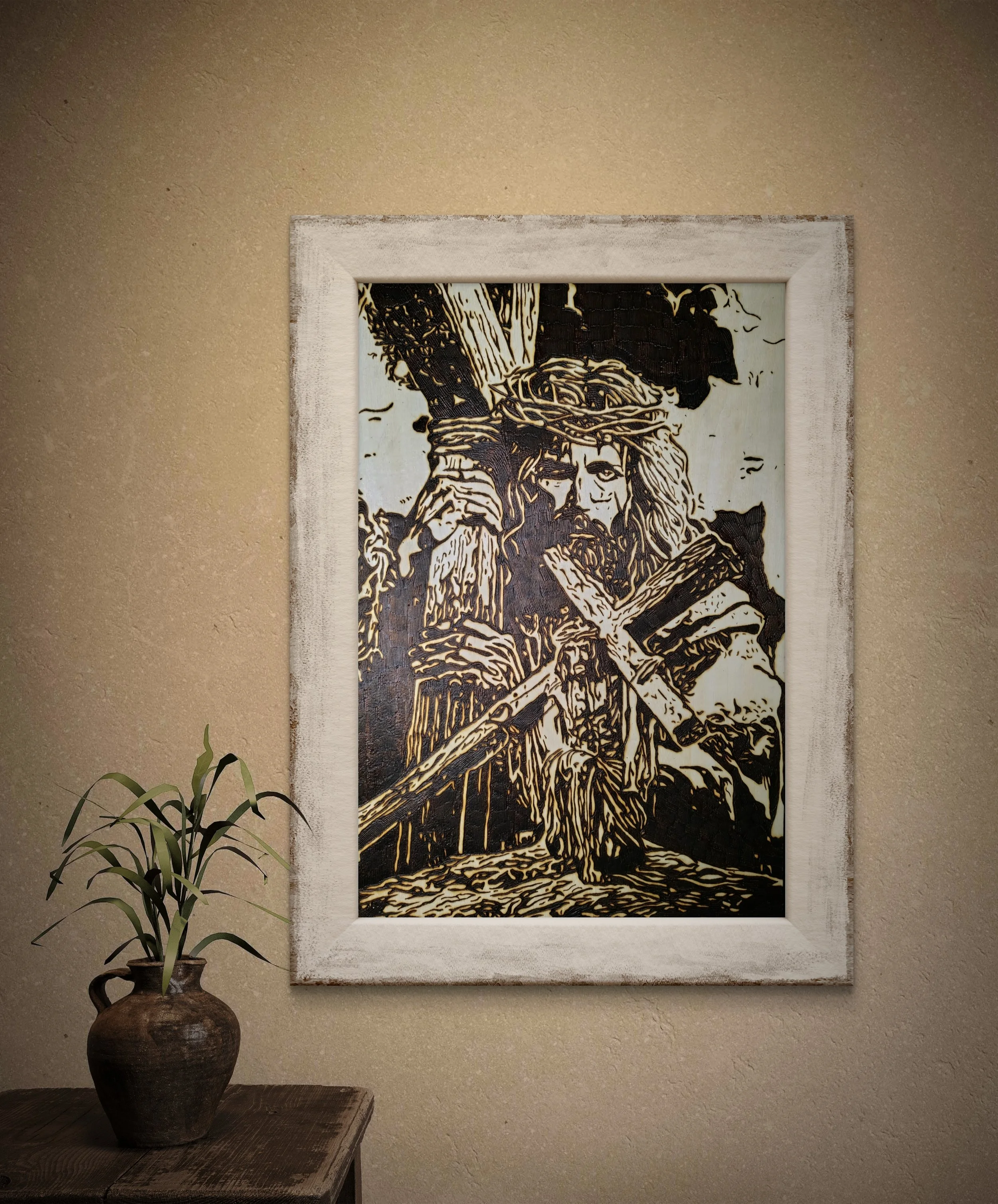 Close-up view of detailed wood-burned wall art illustrating burden and sacrifice, created by hand on basswood