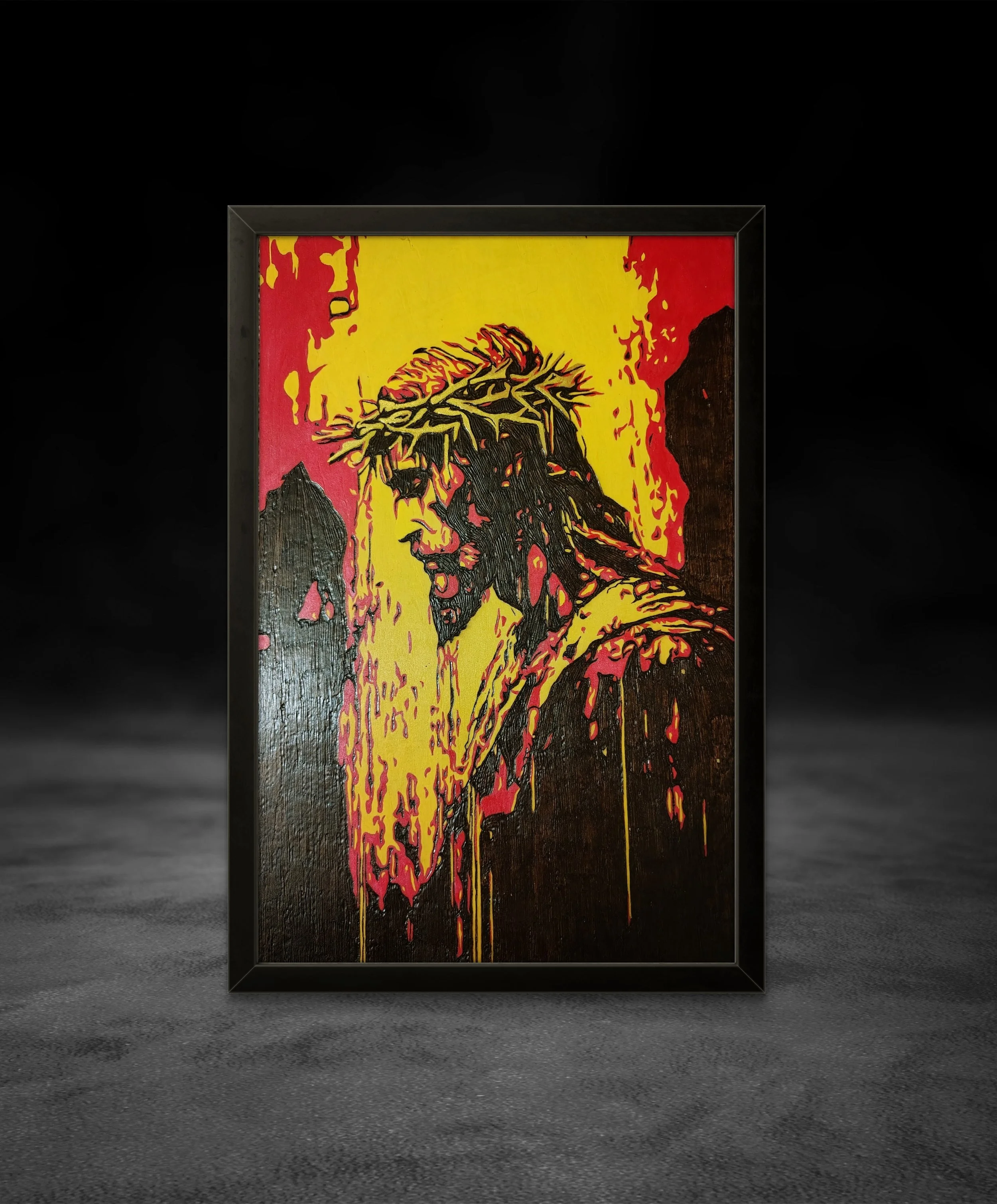 Framed wood burning artwork showing a symbolic religious portrait, handcrafted on natural basswood with intense visual depth