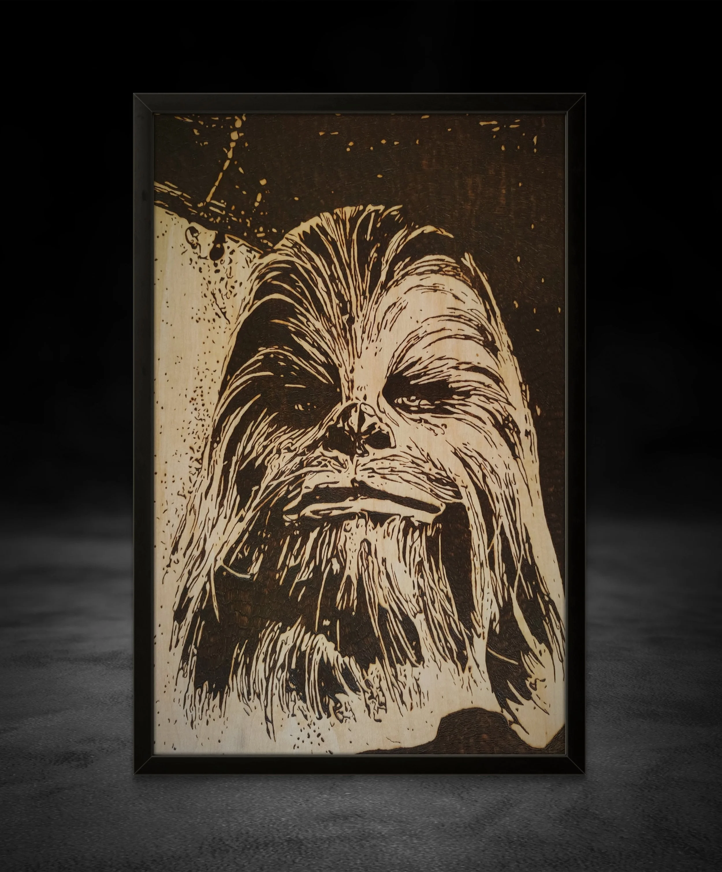 Hand-burned Chewbacca wood artwork framed in black, original pyrography portrait burned into solid basswood, detailed fur texture and high-contrast wood burning art