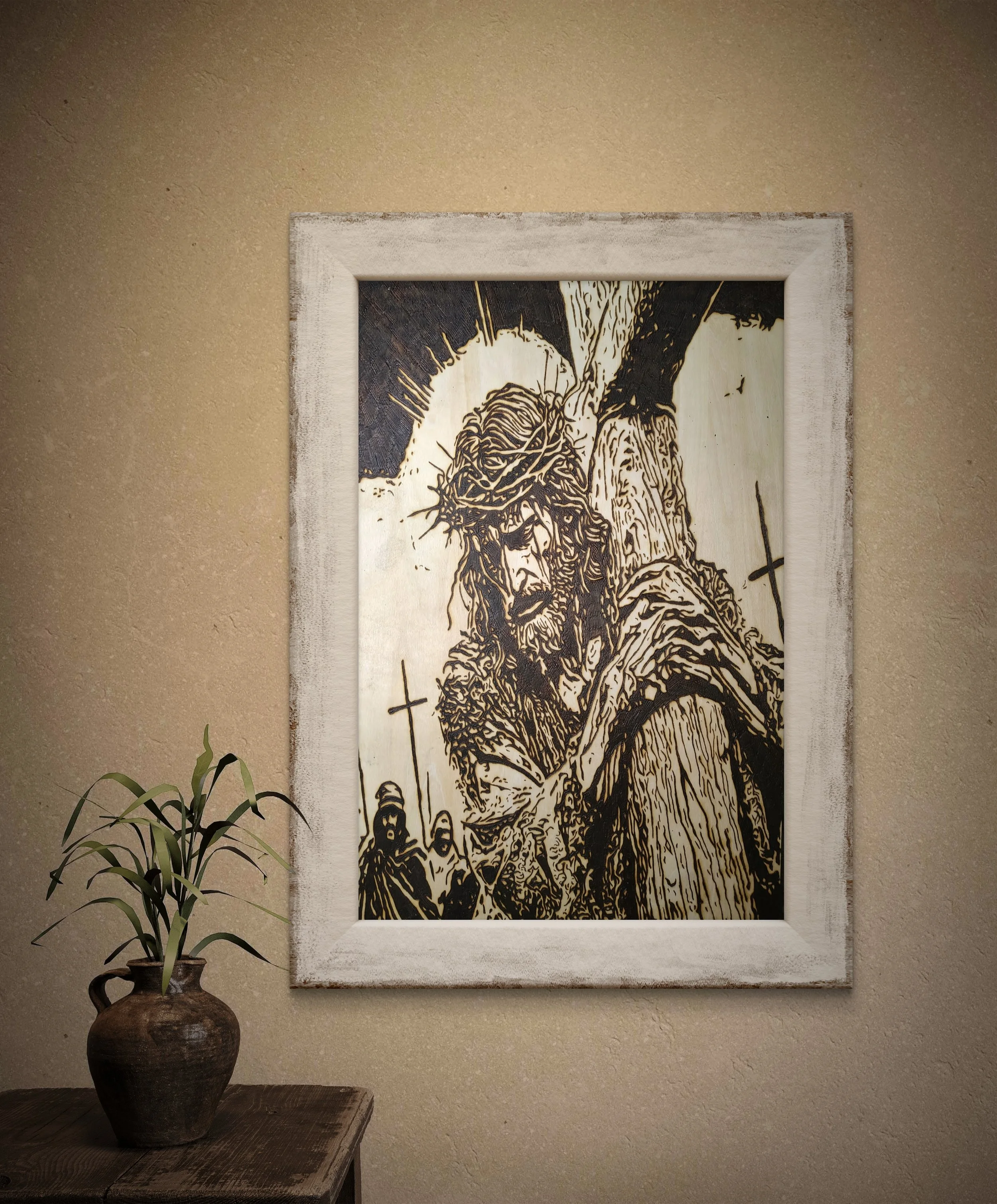 Framed religious wood burning artwork showing Jesus bearing the cross, handcrafted on natural basswood