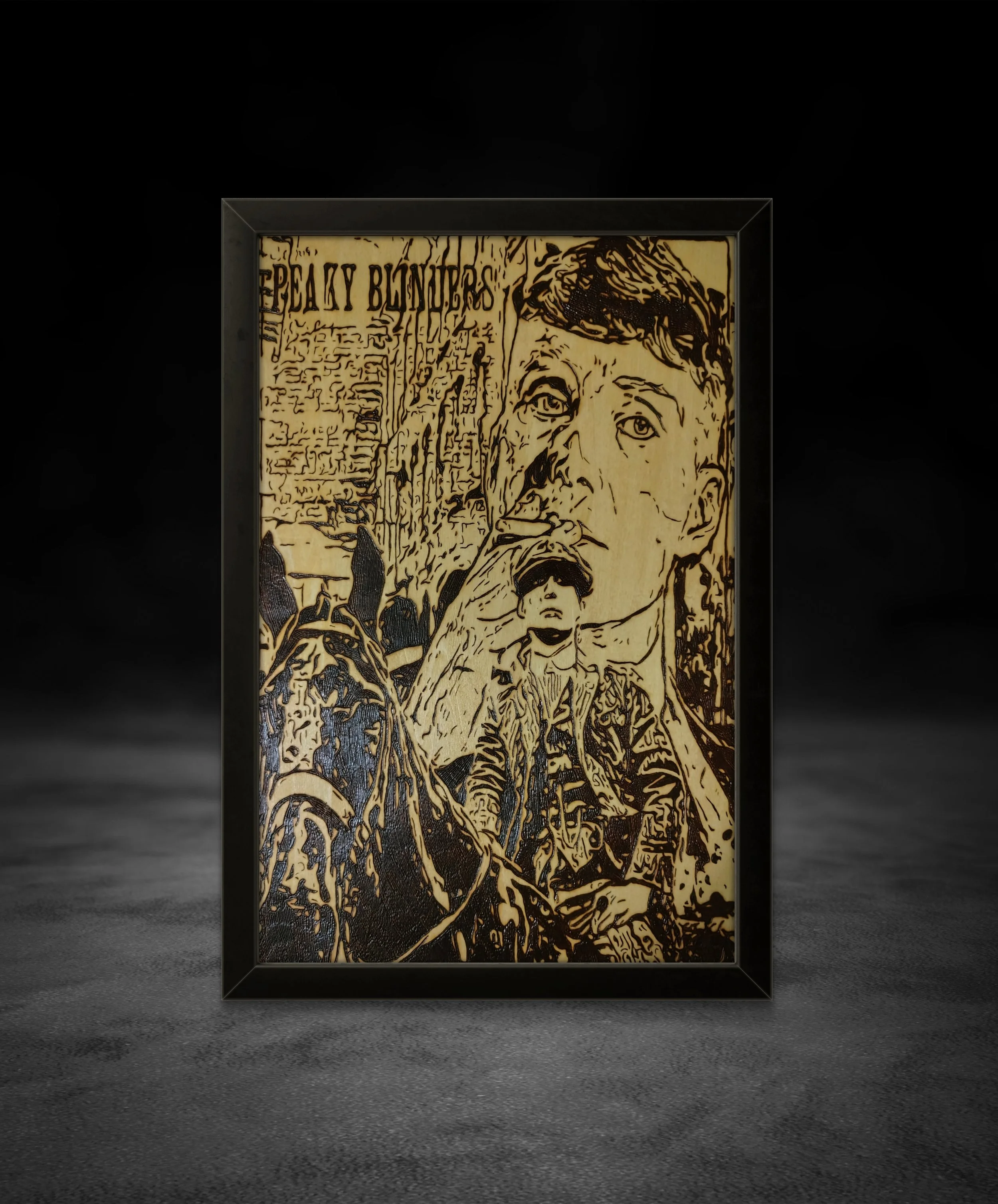 Framed 12x18 hand-burned wood art inspired by Peaky Blinders, photographed in a styled interior setting to show scale and presence.