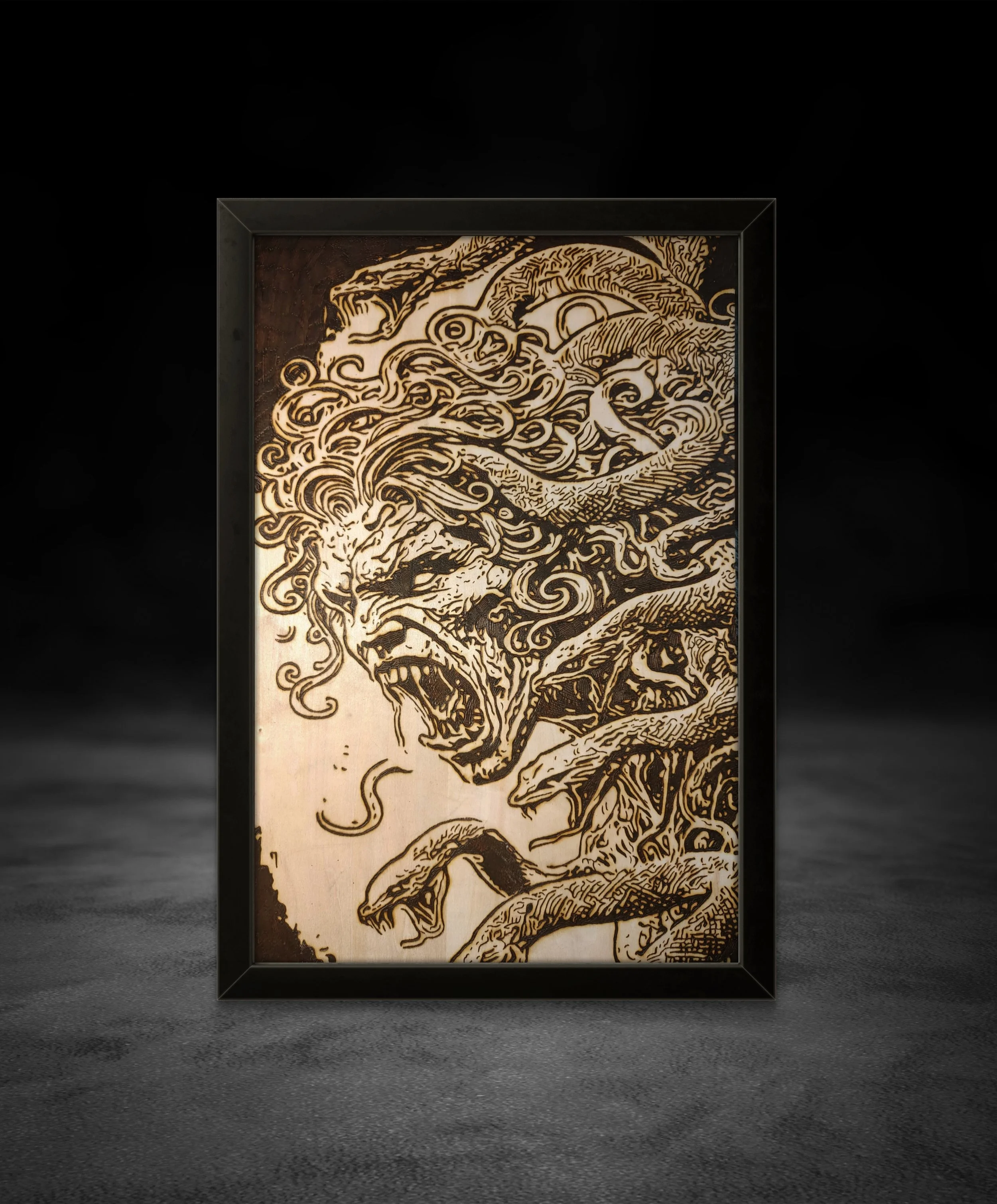 Hand-burned wood art depicting a ferocious mythological creature with flowing organic lines, deep shadows, and intricate pyrography detail.