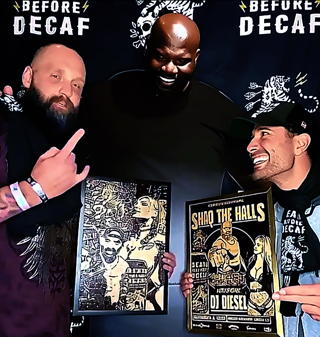 The Artist Mohawk Wyatt, Death before decaf coffee founder, and Shaquille O’Neal posing together while holding custom artwork created for a promotional event, photographed in front of a branded “Death Before Decaf” backdrop