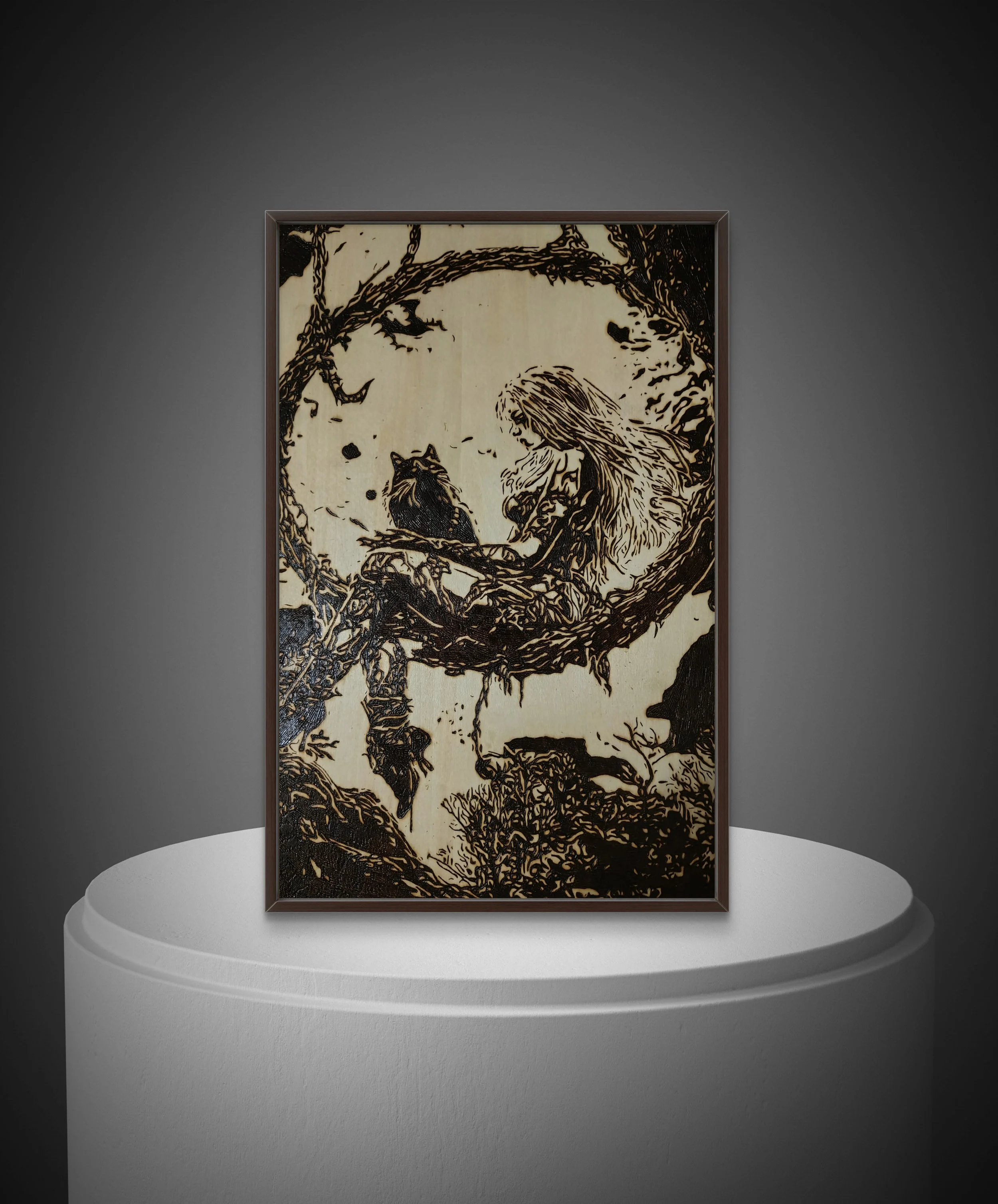 Close-up view of a hand-burned wood art piece showing detailed organic textures and flowing circular composition.