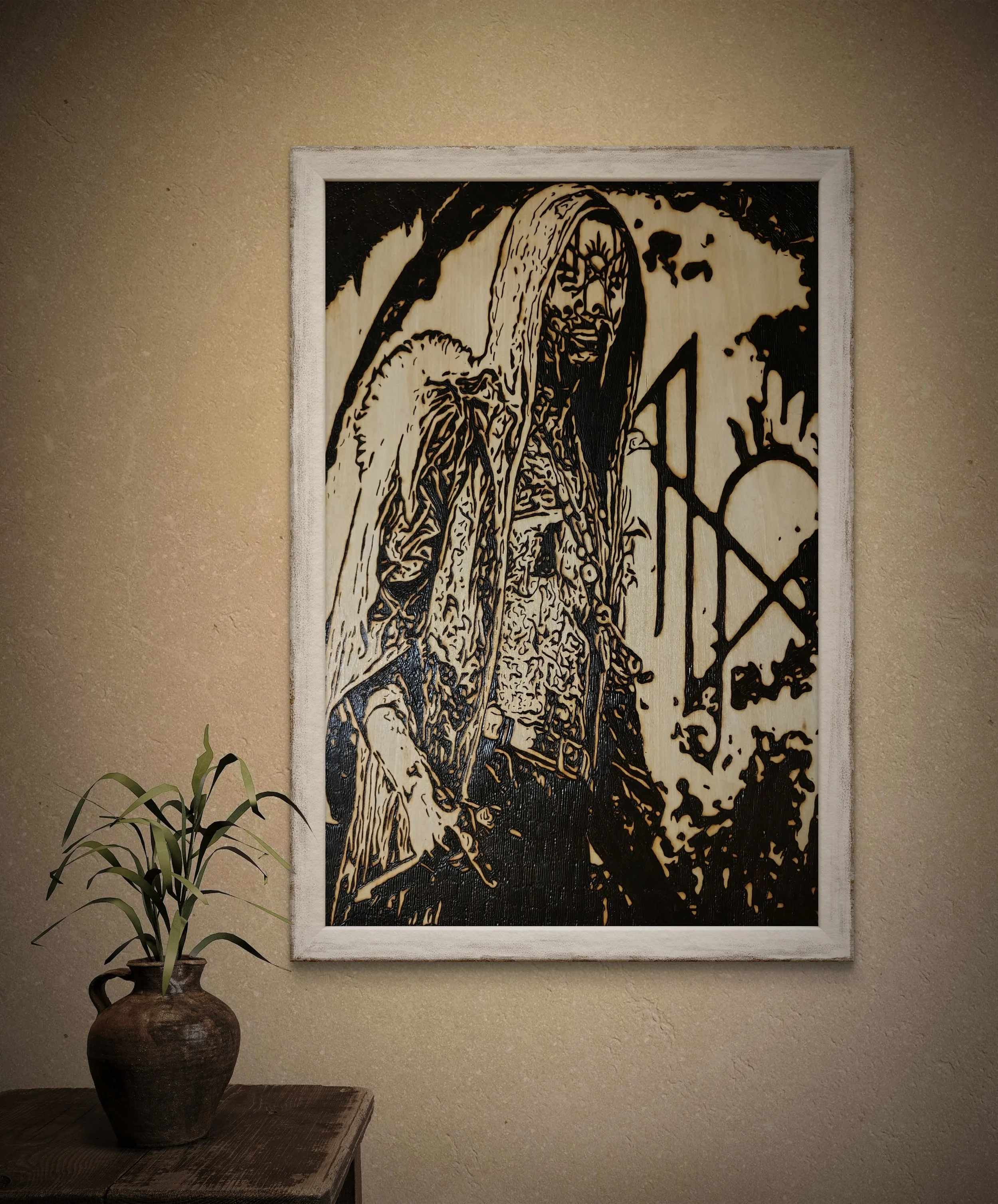 Hand-burned pyrography wall art depicting a masked figure in ritual pose, showcasing original wood burning artwork framed and displayed in a modern interior setting
