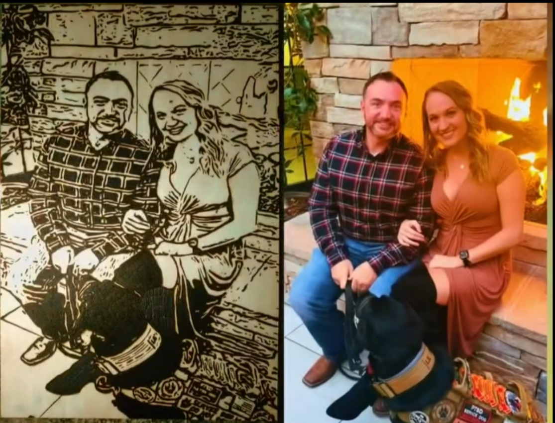 Side-by-side comparison of original photograph and finished custom wood-burned couple portrait seated by a stone fireplace with their dog, showcasing realistic handcrafted pyrography and fine-detail wood burning artwork