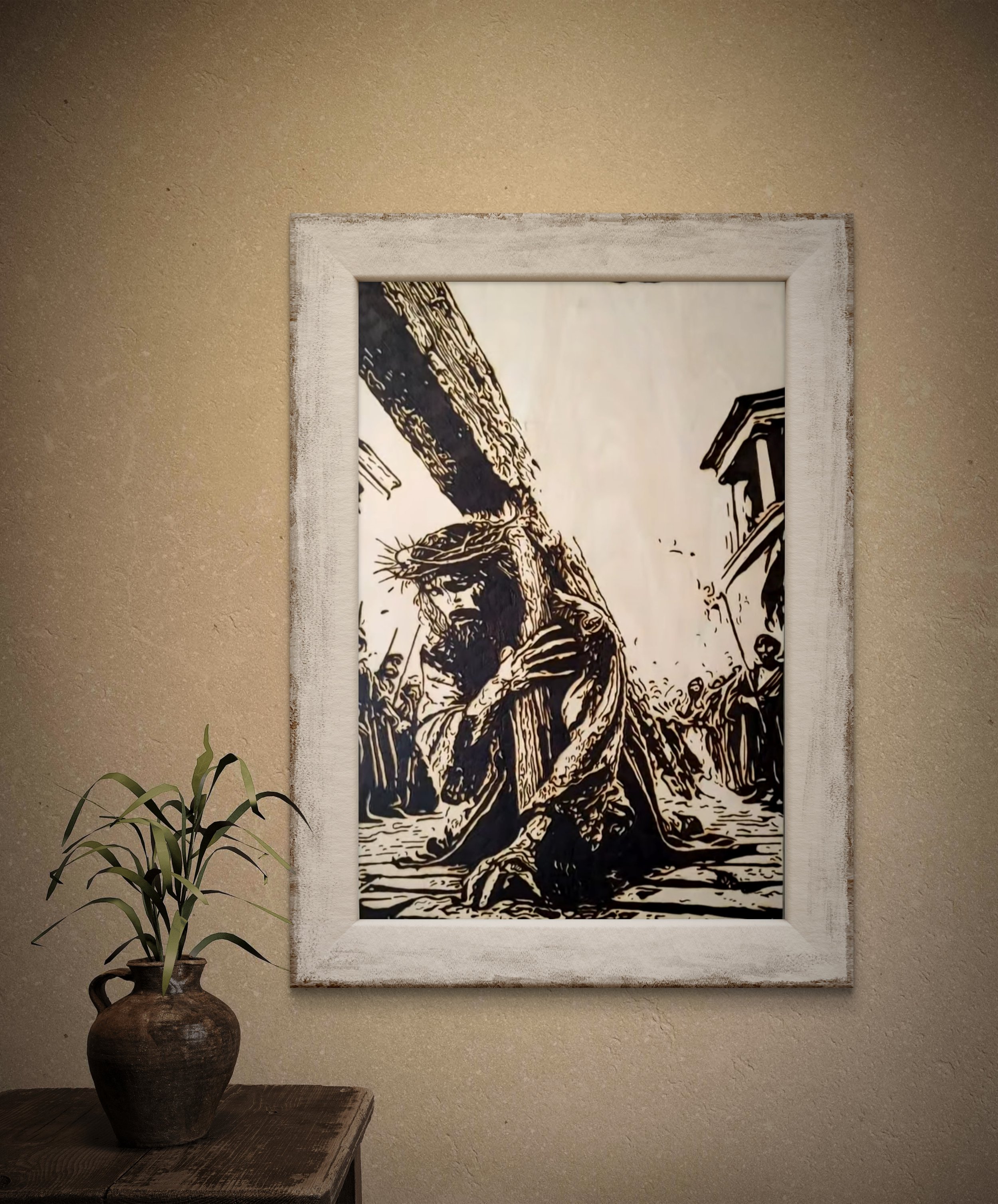 Framed 12x18 hand-burned basswood religious artwork displayed in a modern interior setting