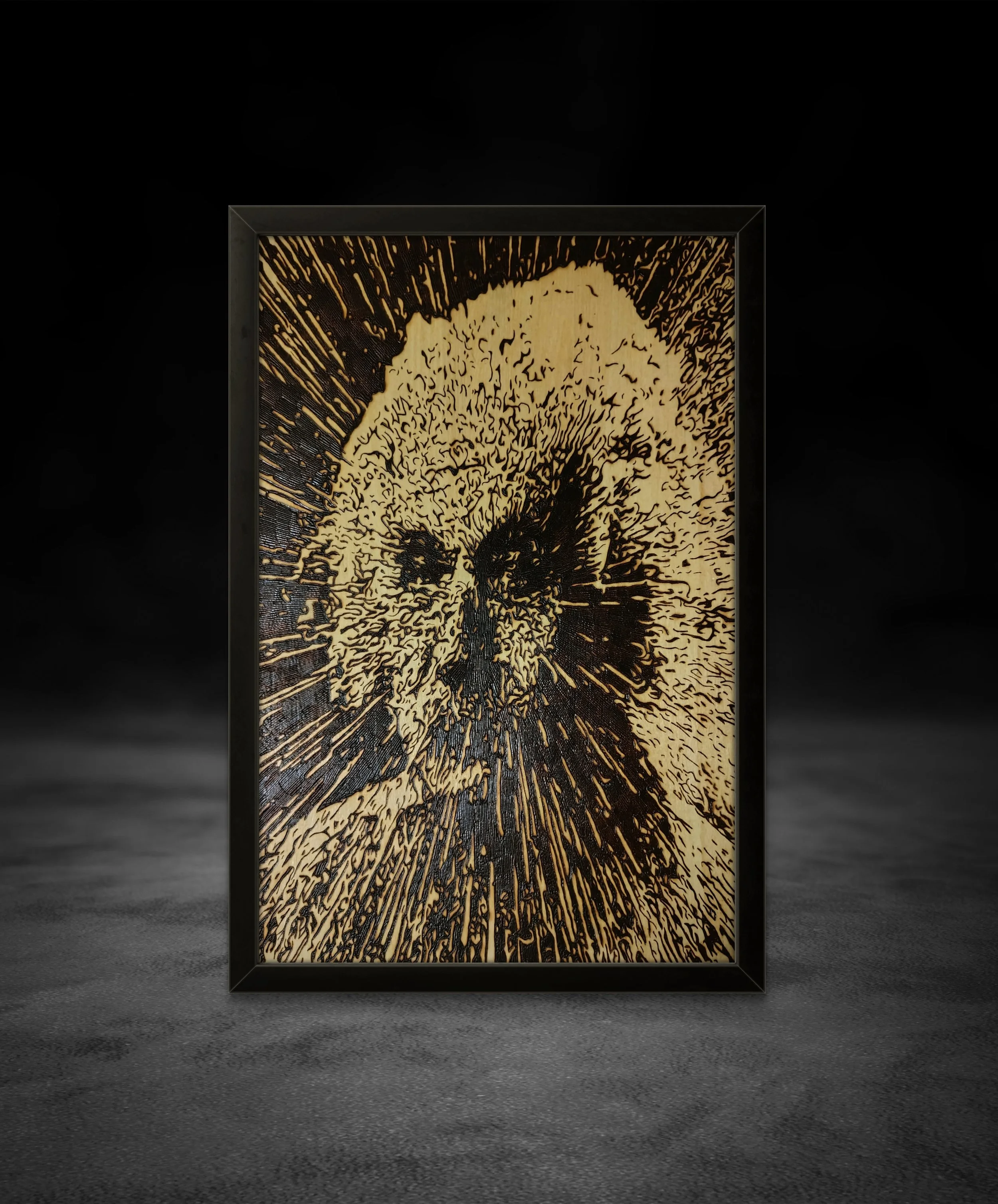 Close-up of detailed wood-burned Albert Einstein with radiating energy lines carved into basswood