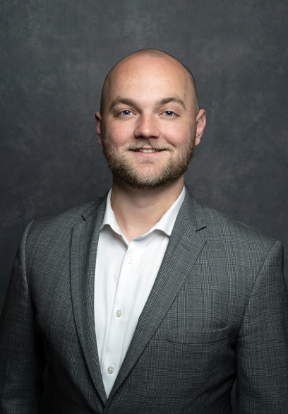 Copy of Crader headshot resized.png