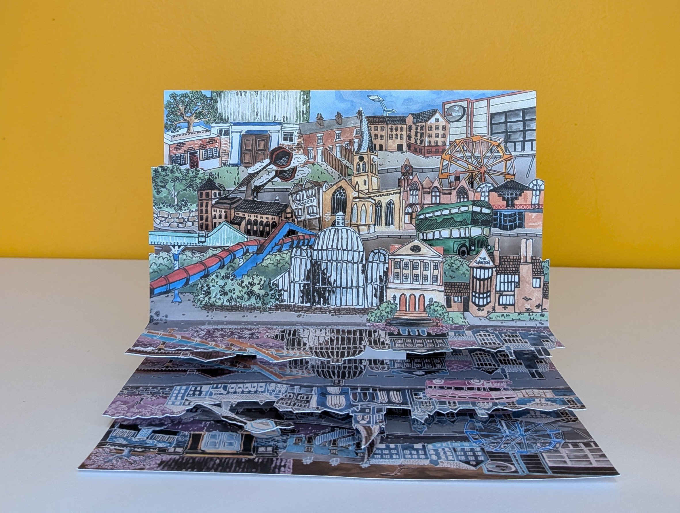An imagined Chesterfield scene, combining key buildings and landmarks from the past and present, discussed in people's memories of the town. These include the Crooked Spire, Queen's Park Sports Centre, and the train station.