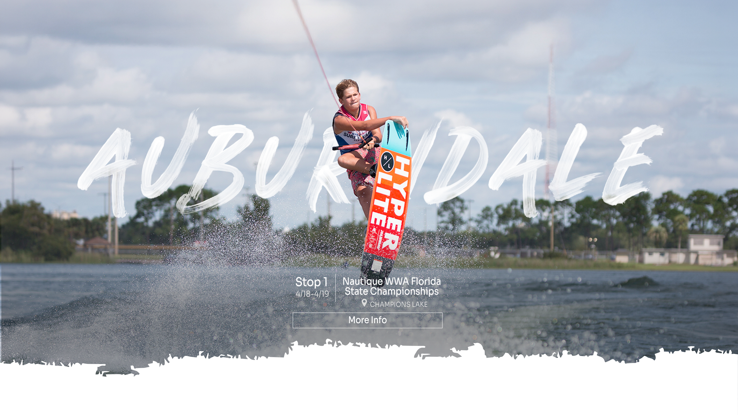 A man performing a wakeboard trick in the water during the Nautique WWA Florida State Championships at Champions Lake, with  the word 'AUBURNDALE' written across the image.