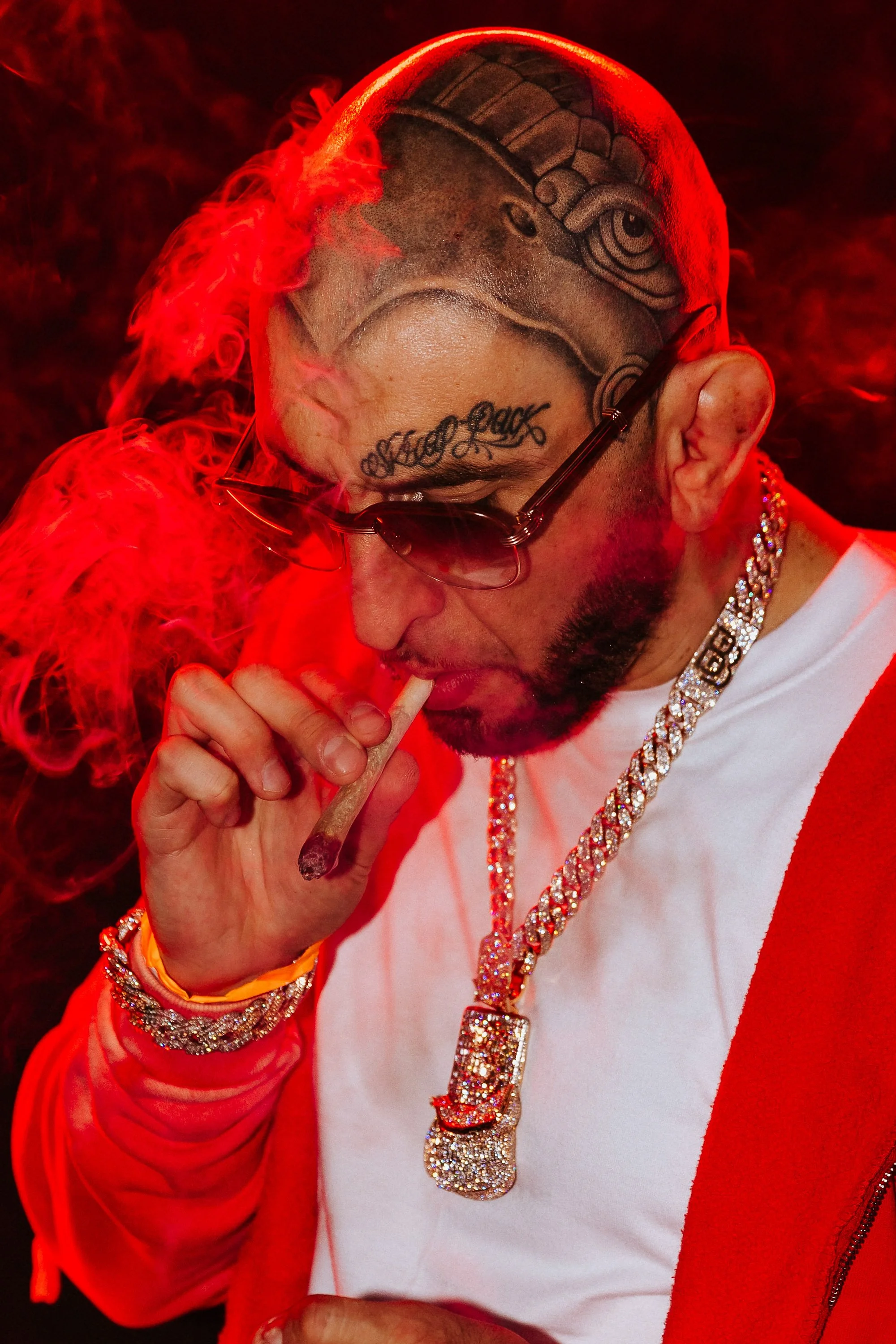 Quesada of Backpack Boyz posing for a puff portrait