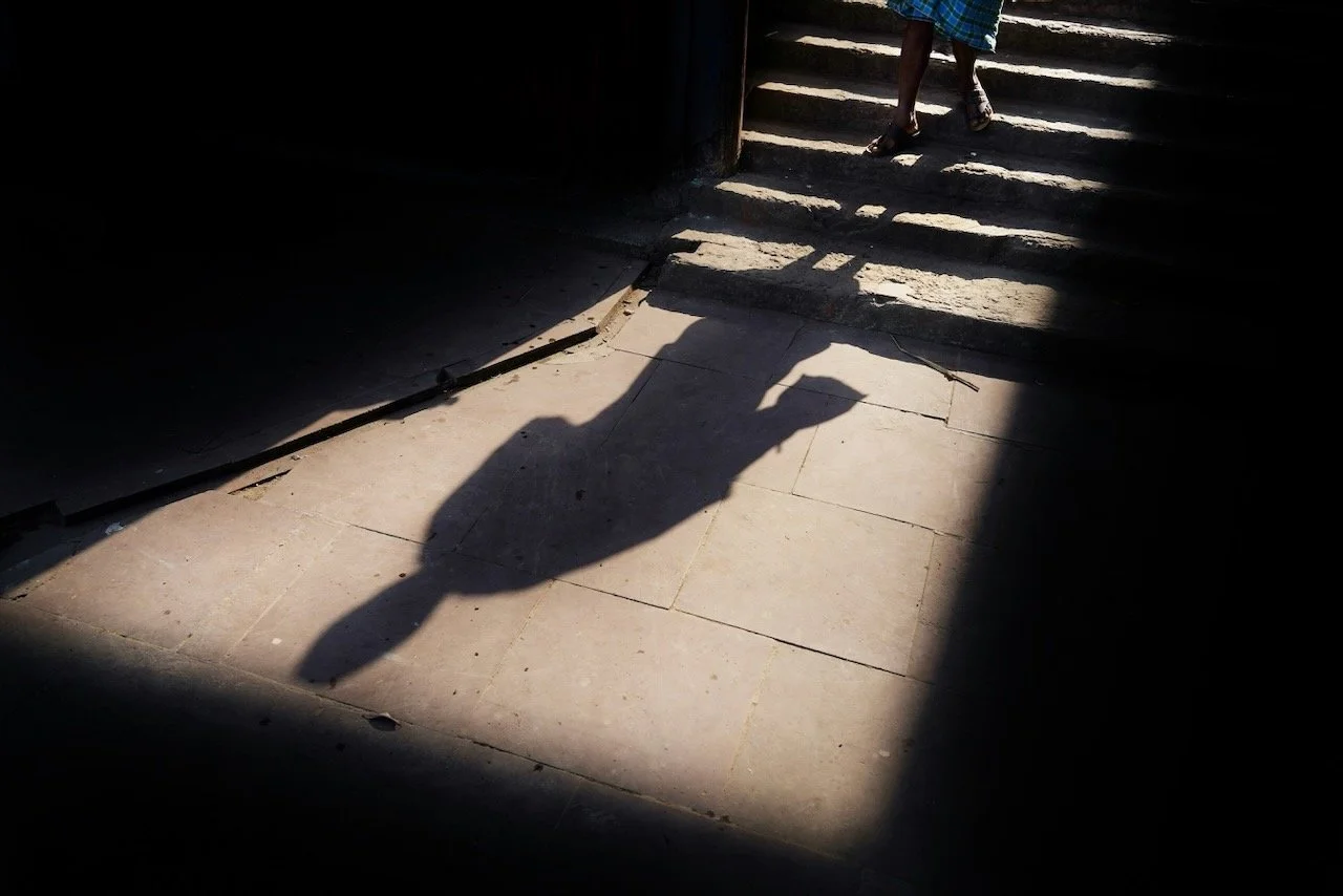 feet and shadows with only a little visible, like fragments of trauma memories