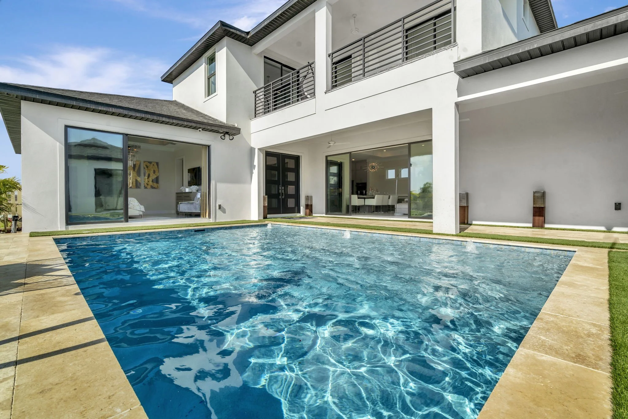 The Courtyard Pool of a DRB Homes Grand Osprey Model at Eagles Cove at Mirada in San Antonio, FL.