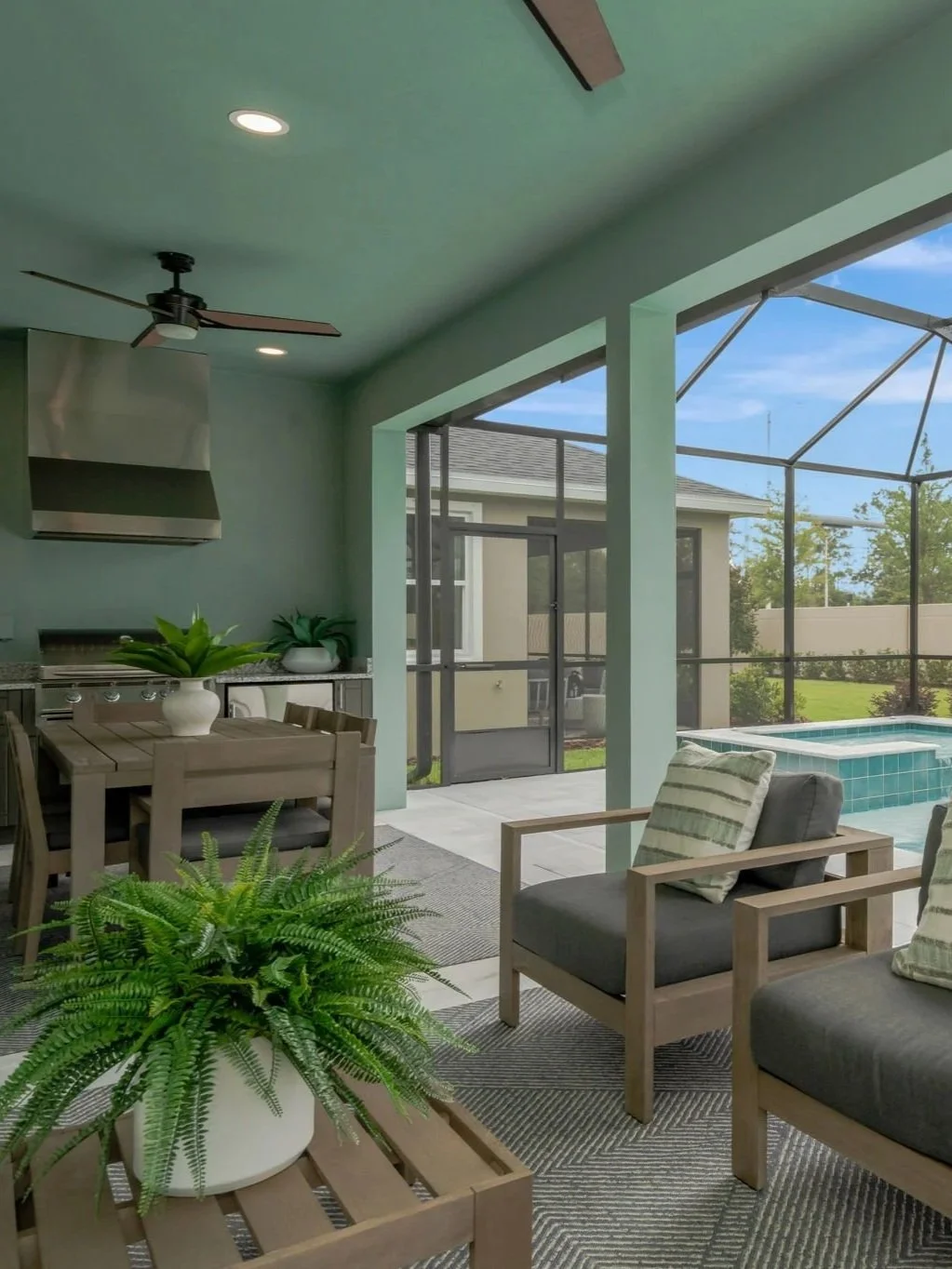 The Outdoor Living Space at a DRB Homes Bromeliad Model at Primrose at Longleaf in New Port Richey, FL.