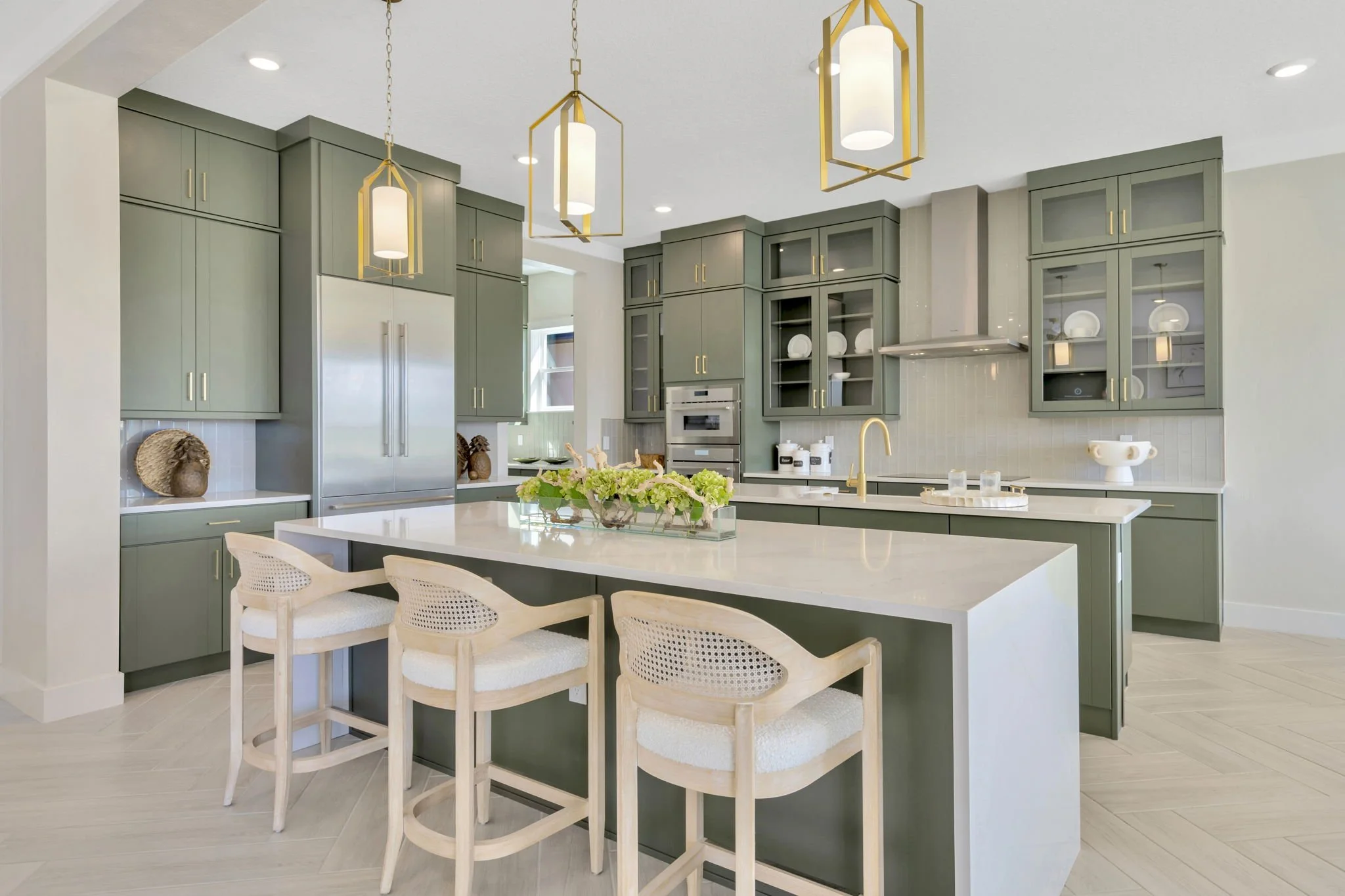 The Chef's Kitchen of a DRB Homes Grand Sabal Model at Biscayne Landing at Seaire in Parrish, FL.