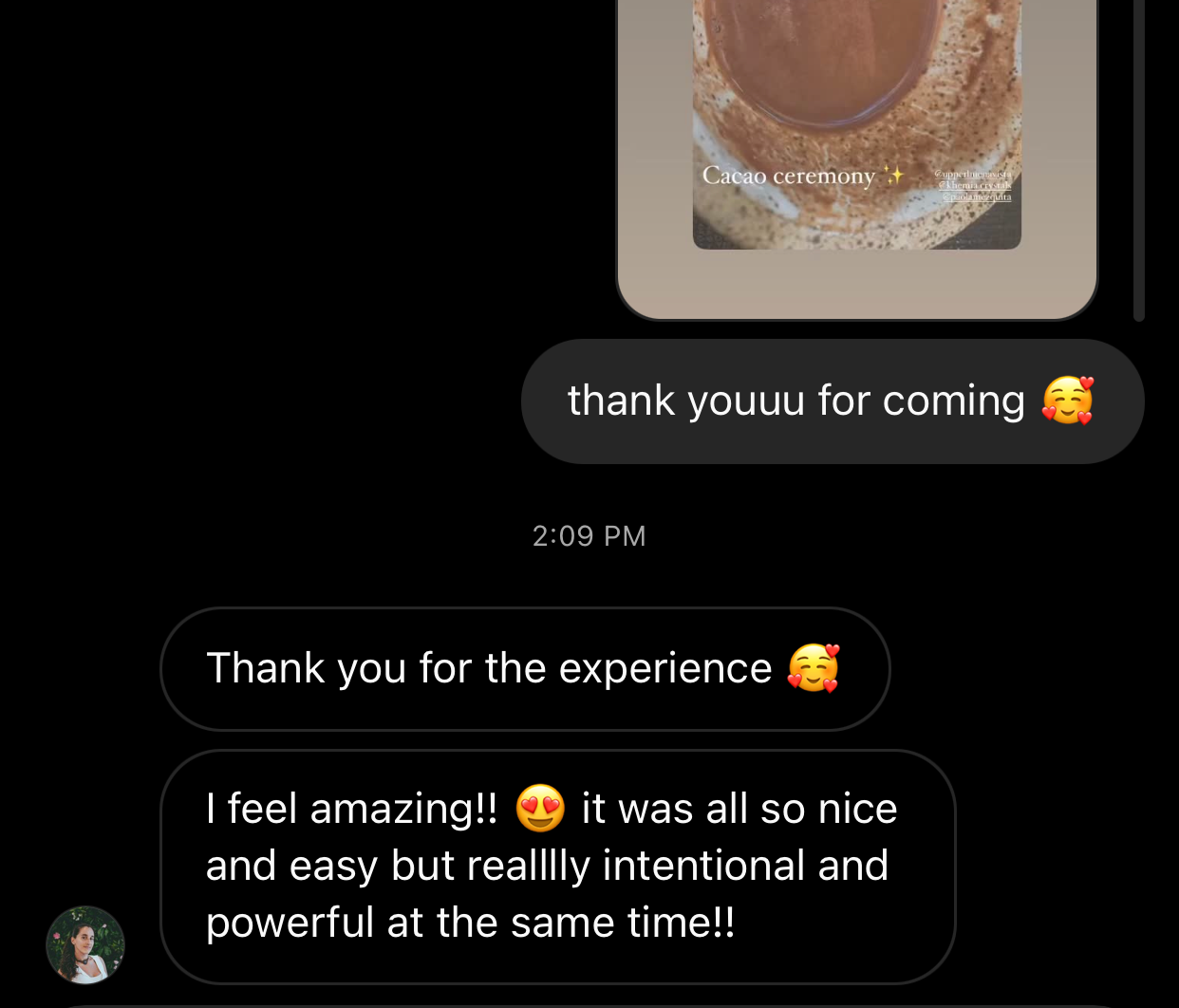 Close-up of a cup of cacao or hot chocolate on a beige and brown speckled surface, with the words 'Cacao ceremony' and sparkles overlayed.