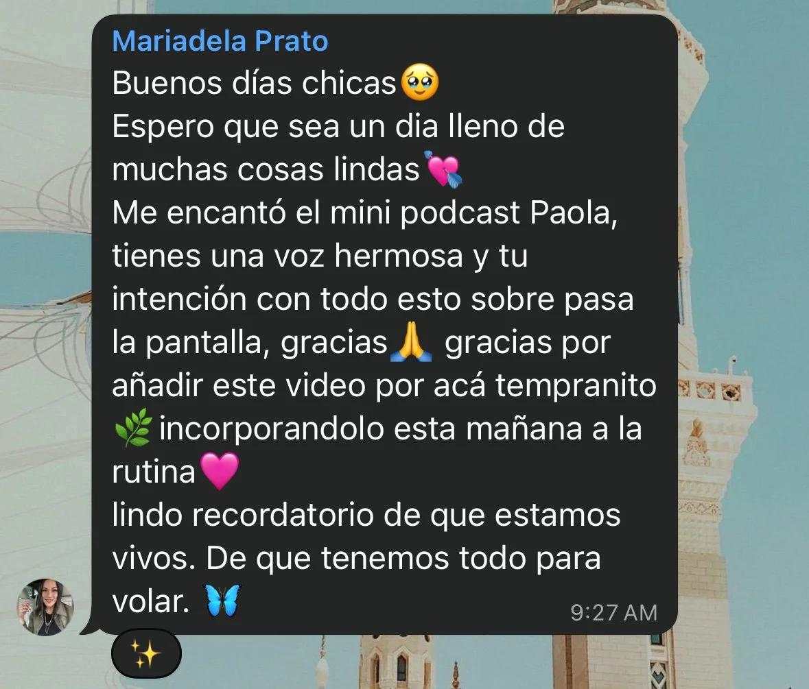 Screenshot of a WhatsApp message with a background showing part of a building with distant architecture, possibly a tower or historic structure, and a portion of a blue sky.