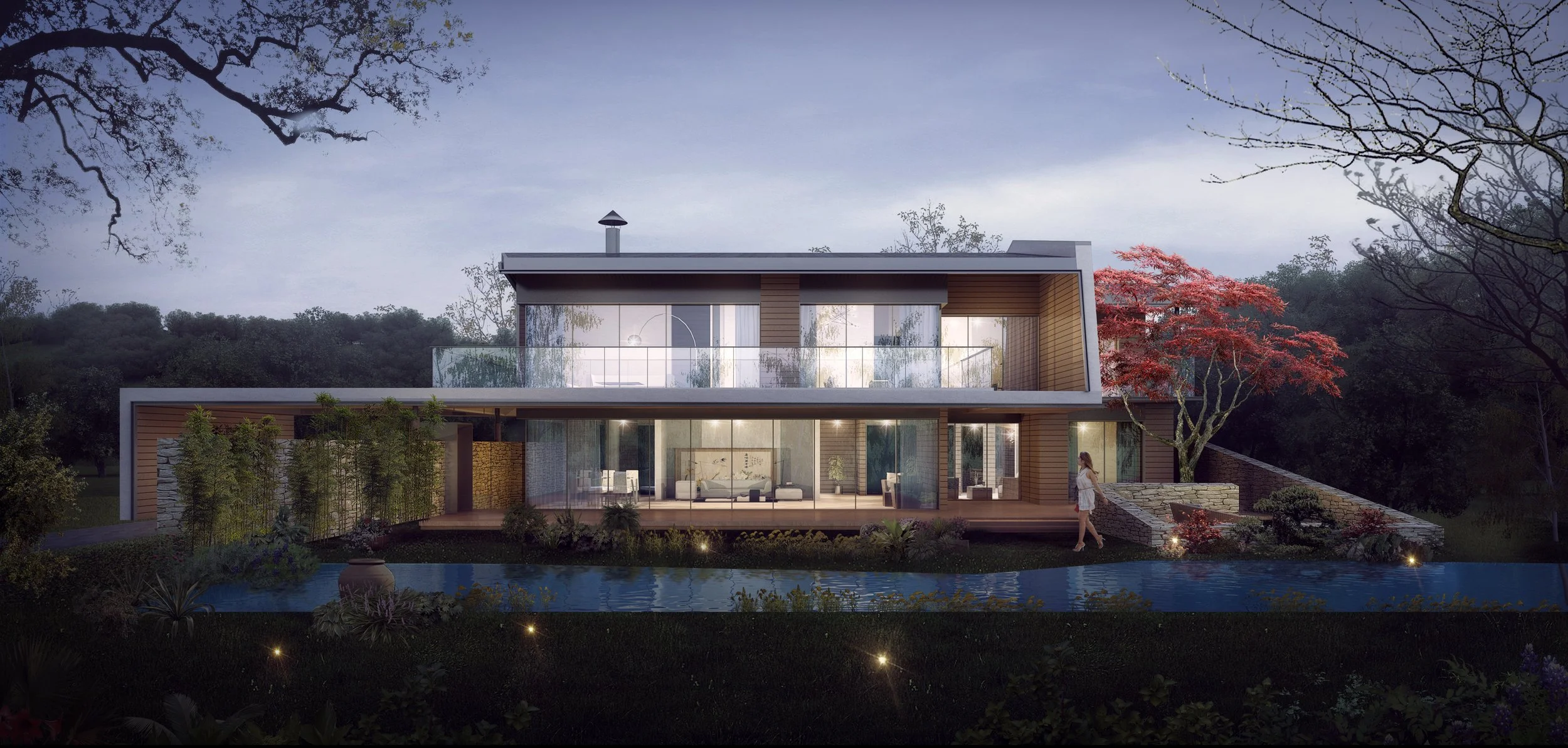 A modern two-story house with large windows, surrounded by trees and plants, with a pond in the foreground and a person walking on a pathway.