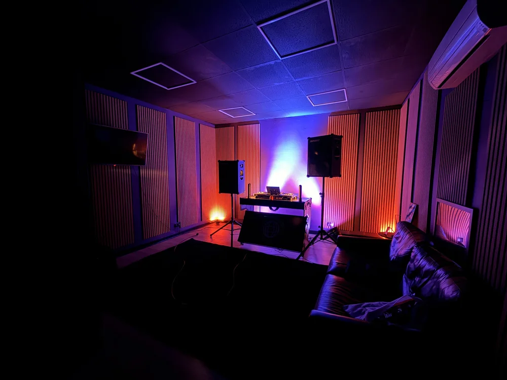The Portal DJ and podcast studio at STU 22 with purple lighting