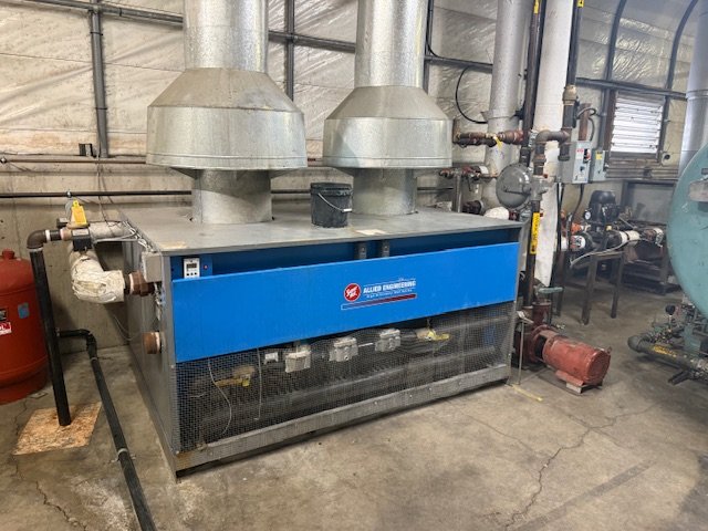 Industrial HVAC or ventilation system in a mechanical room.