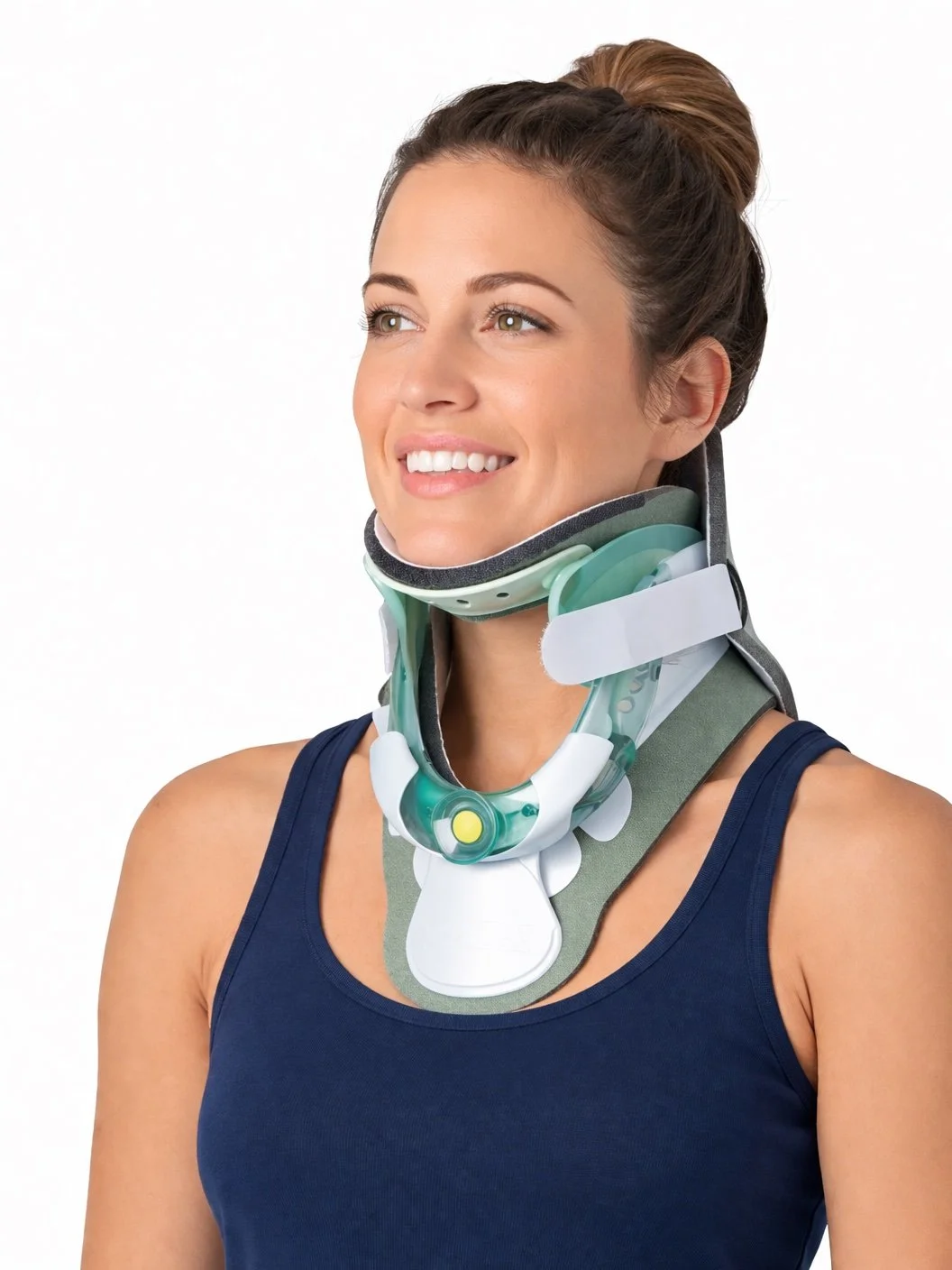 Woman wearing a neck brace with a head immobilizer, smiling