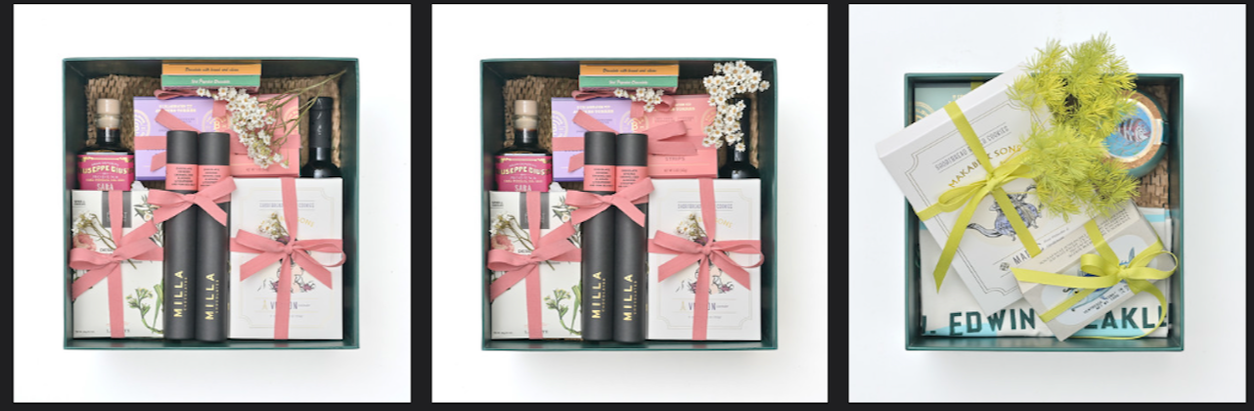 Three gift boxes filled with various items such as candles, soap, and flowers, decorated with ribbons and bows.