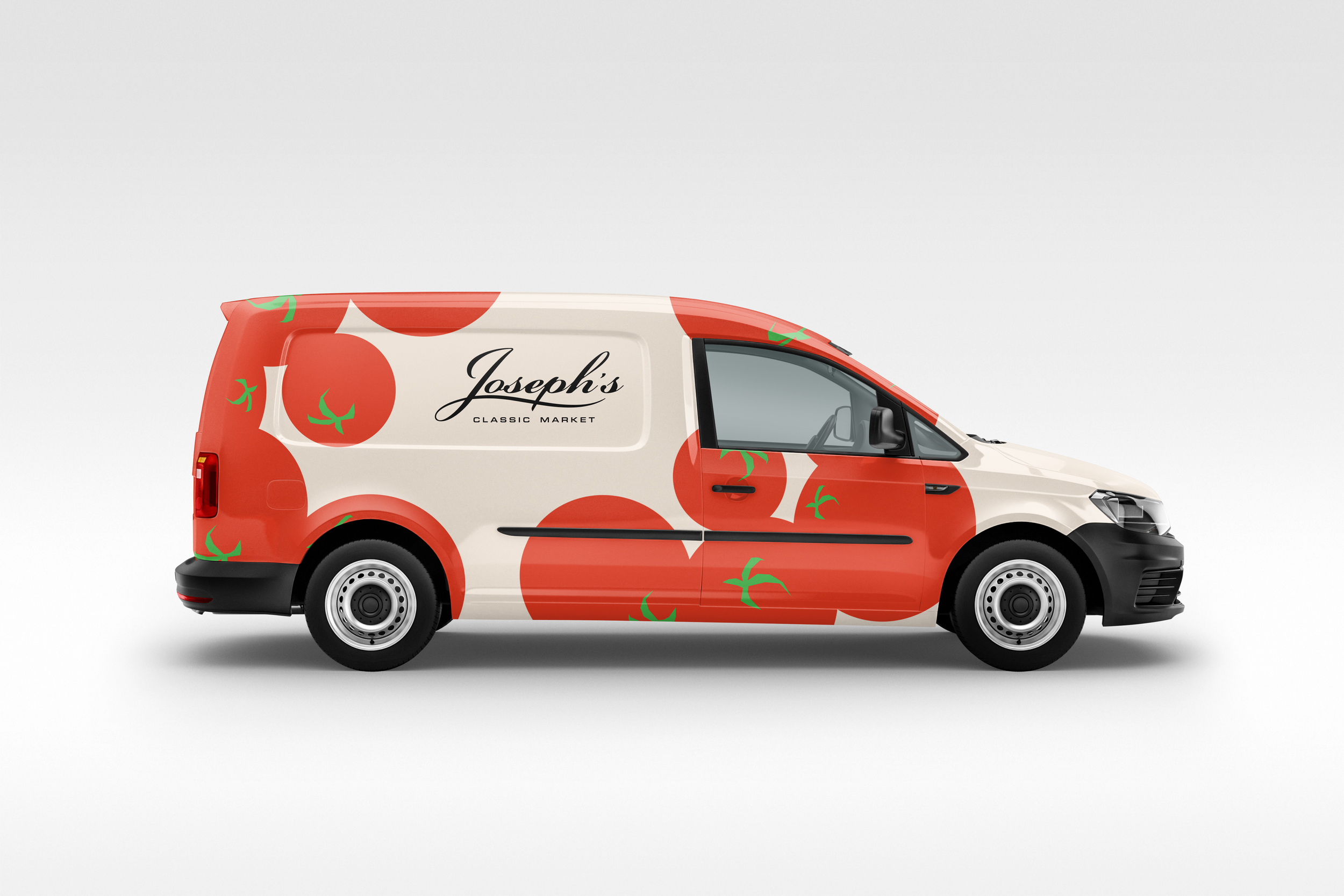 A delivery van with a colorful tomato-themed design and the text 'Joseph's Classic Market' on the side. Robert Ranfranz branding, design and packaging.