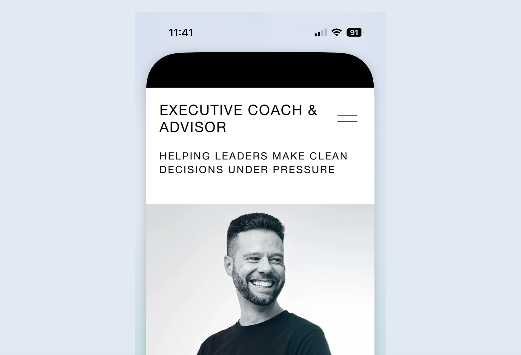 Smartphone screen displaying a profile page of an executive coach and advisor, with a black and white photo of a smiling man with short dark hair and beard. Robert Ranfranz branding, design and ecommerce.
