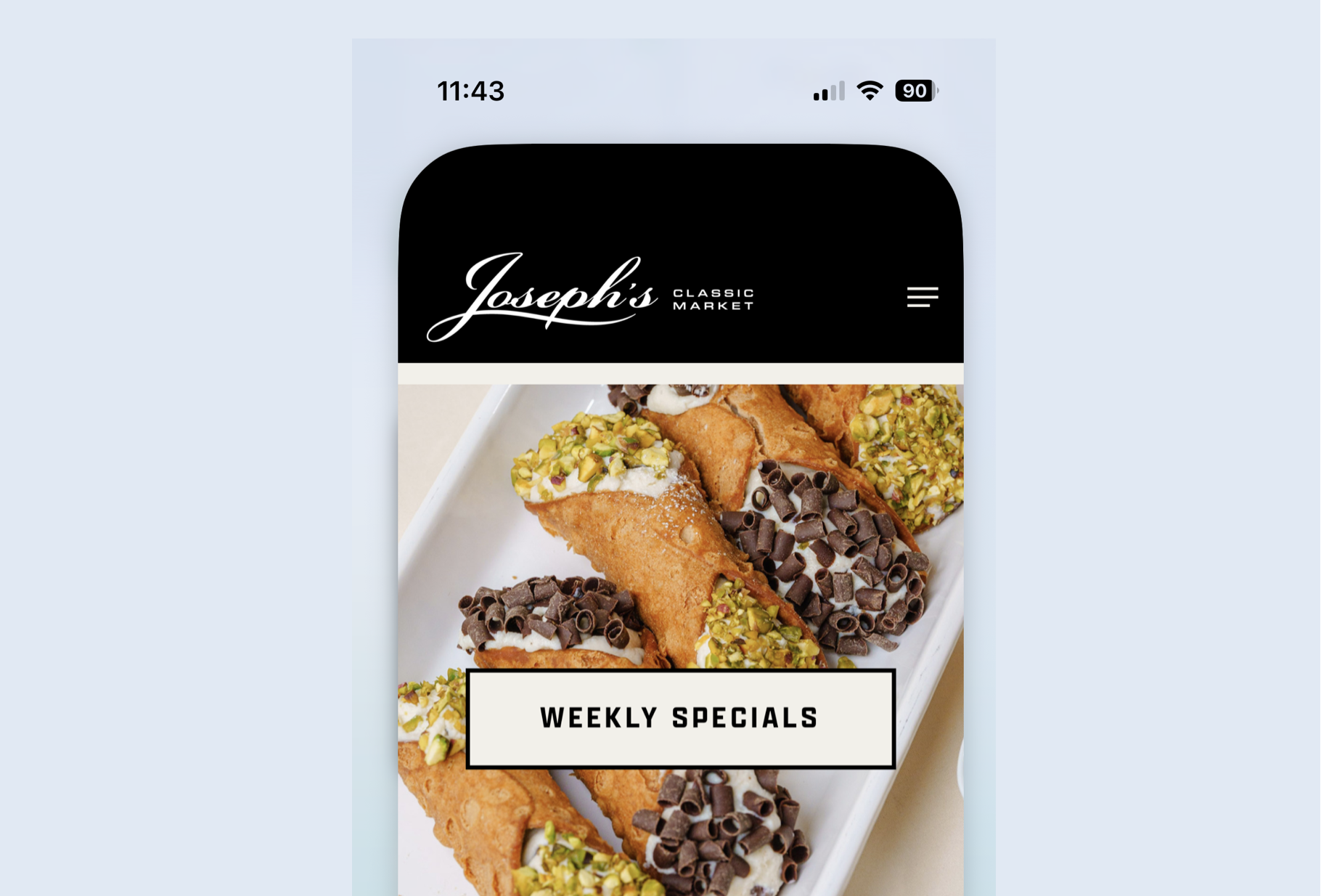 Screenshot of a mobile website for Joseph's Classic Market displaying a tray of cannoli with chocolate and pistachio toppings, under a section labeled Weekly Specials. Robert Ranfranz branding, design and ecommerce.