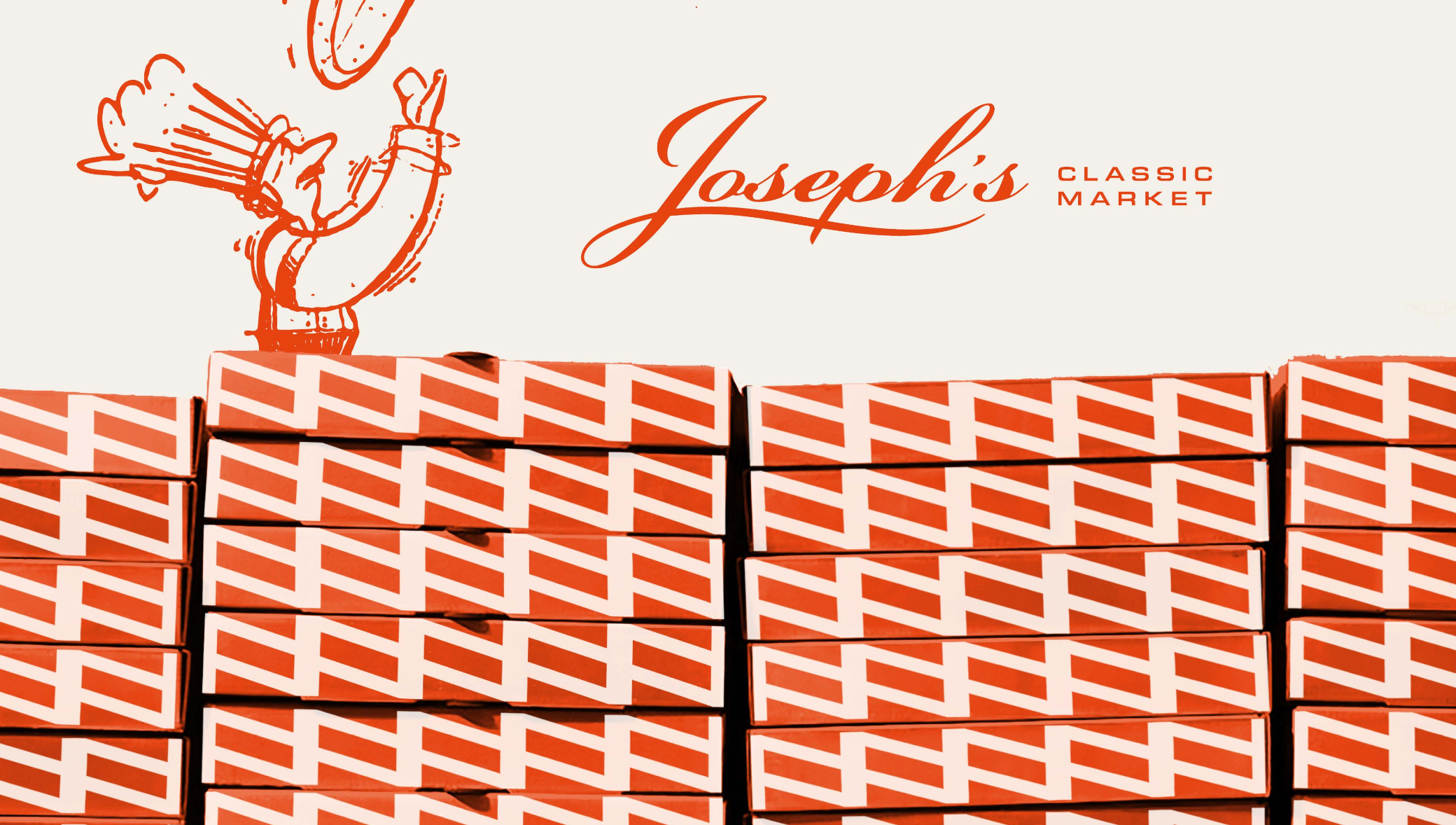 Stacked boxes with a red and white geometric pattern in front of a wall with the logo 'Joseph's Classic Market' and a line drawing of a chef tossing pizza dough.
