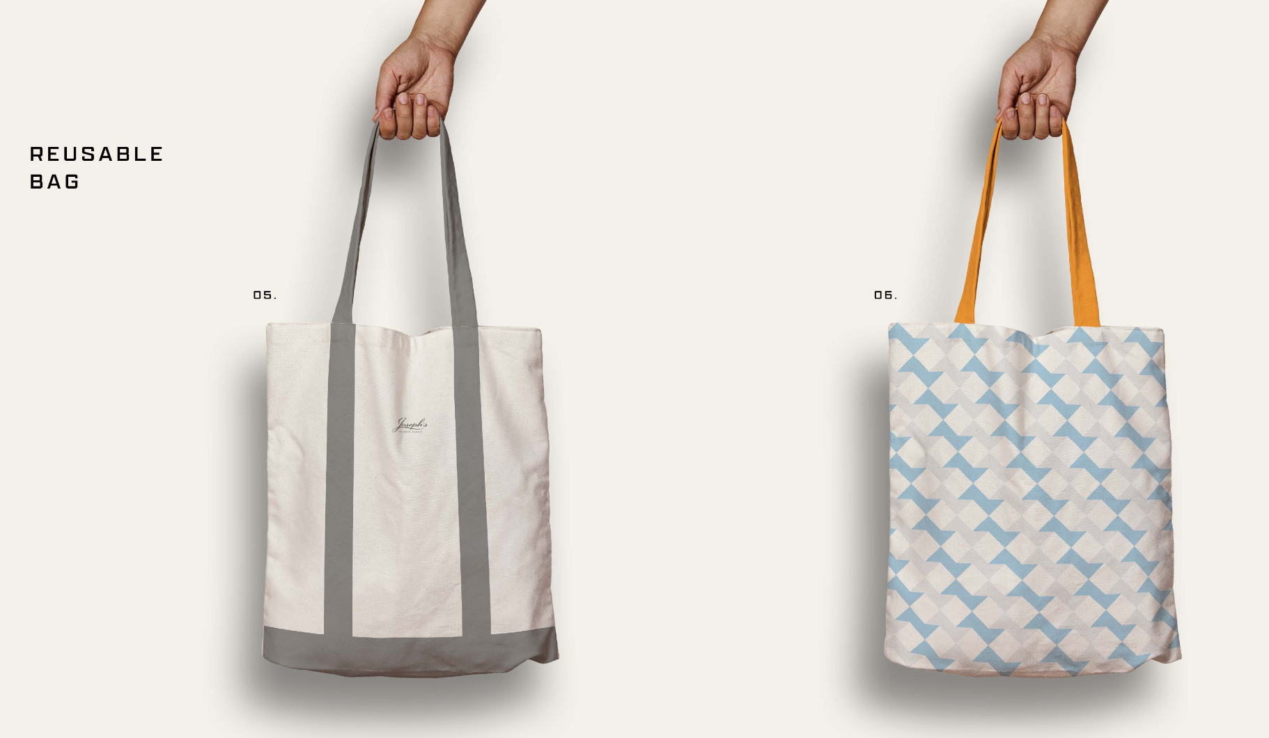 Two reusable fabric shopping bags being held by hands, one with gray handles and the other with orange handles, against a plain background.