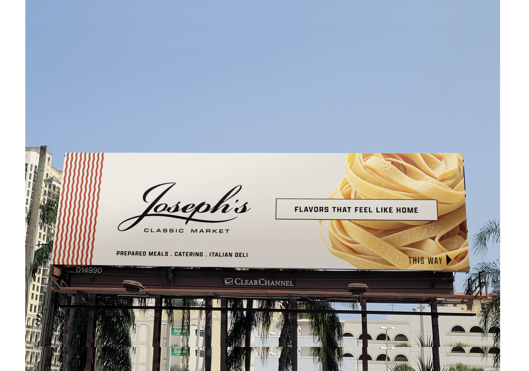 Billboard advertising Joseph's Classic Market, featuring an image of pasta with a direction arrow and the text "Flavors that feel like home". Robert Ranfranz branding, design and retail.