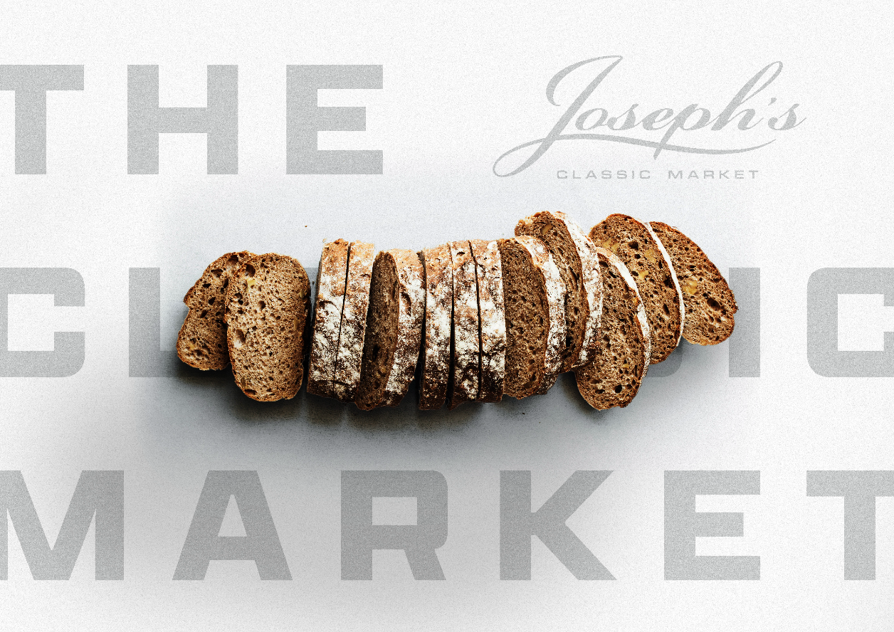 Slices of rustic brown bread arranged on a white surface with 'Joseph's Classic Market' printed in the background.