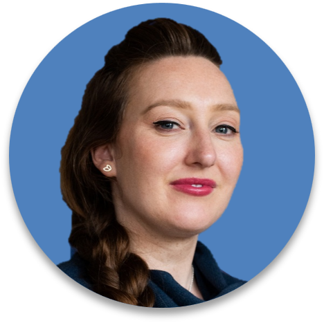 A woman with brown hair in a braid, wearing a dark top, against a blue circular background.