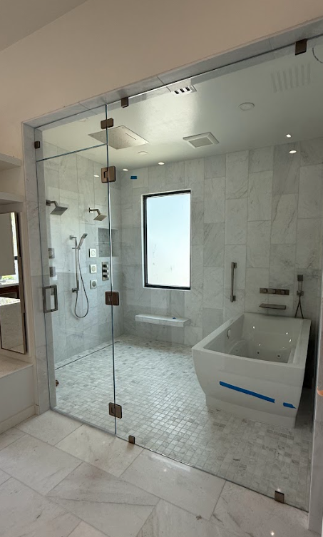 frameless-tub-shower-enclosure-modern.jpg