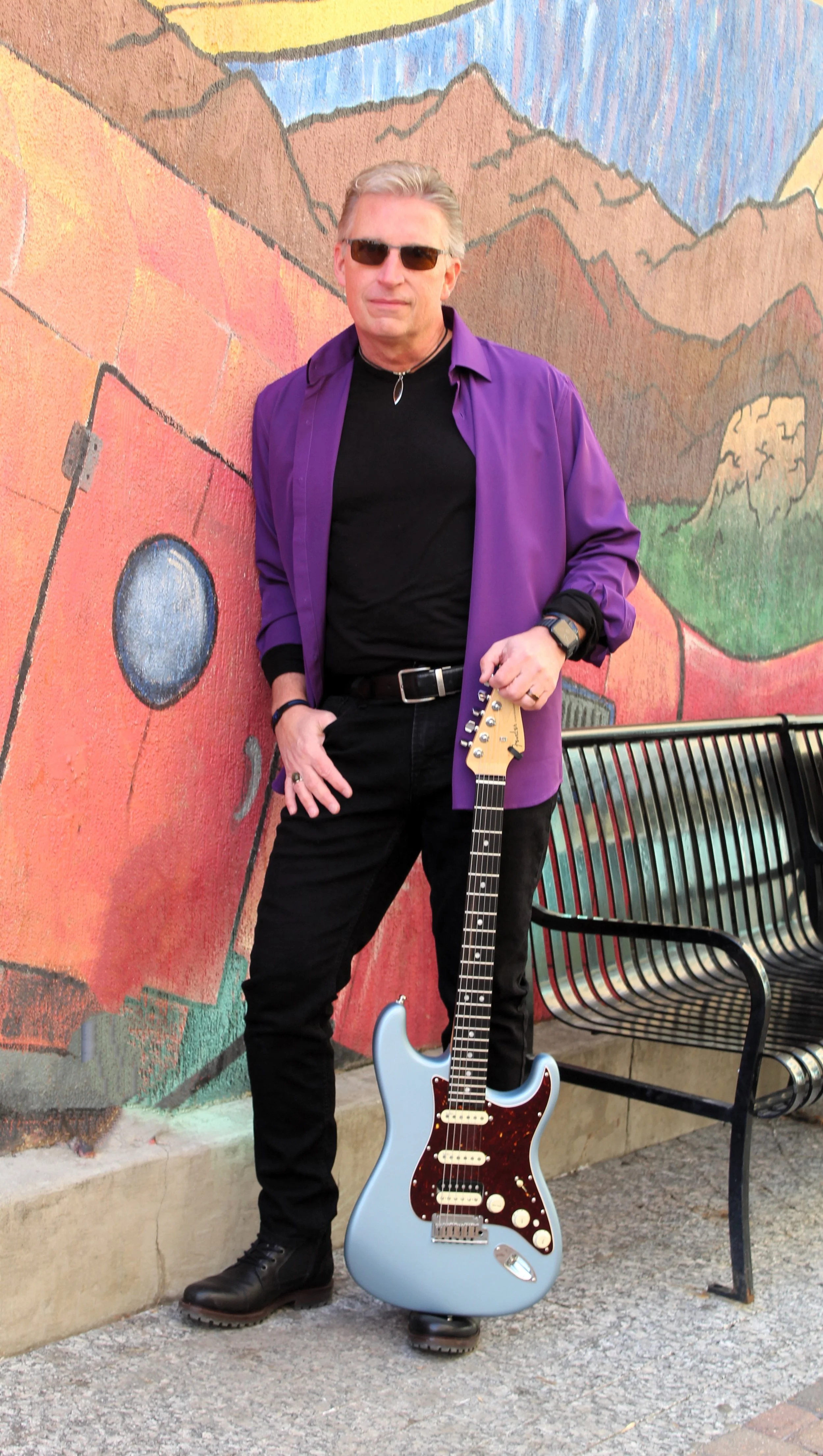 James Solo Holding Guitar Upright 1.JPG