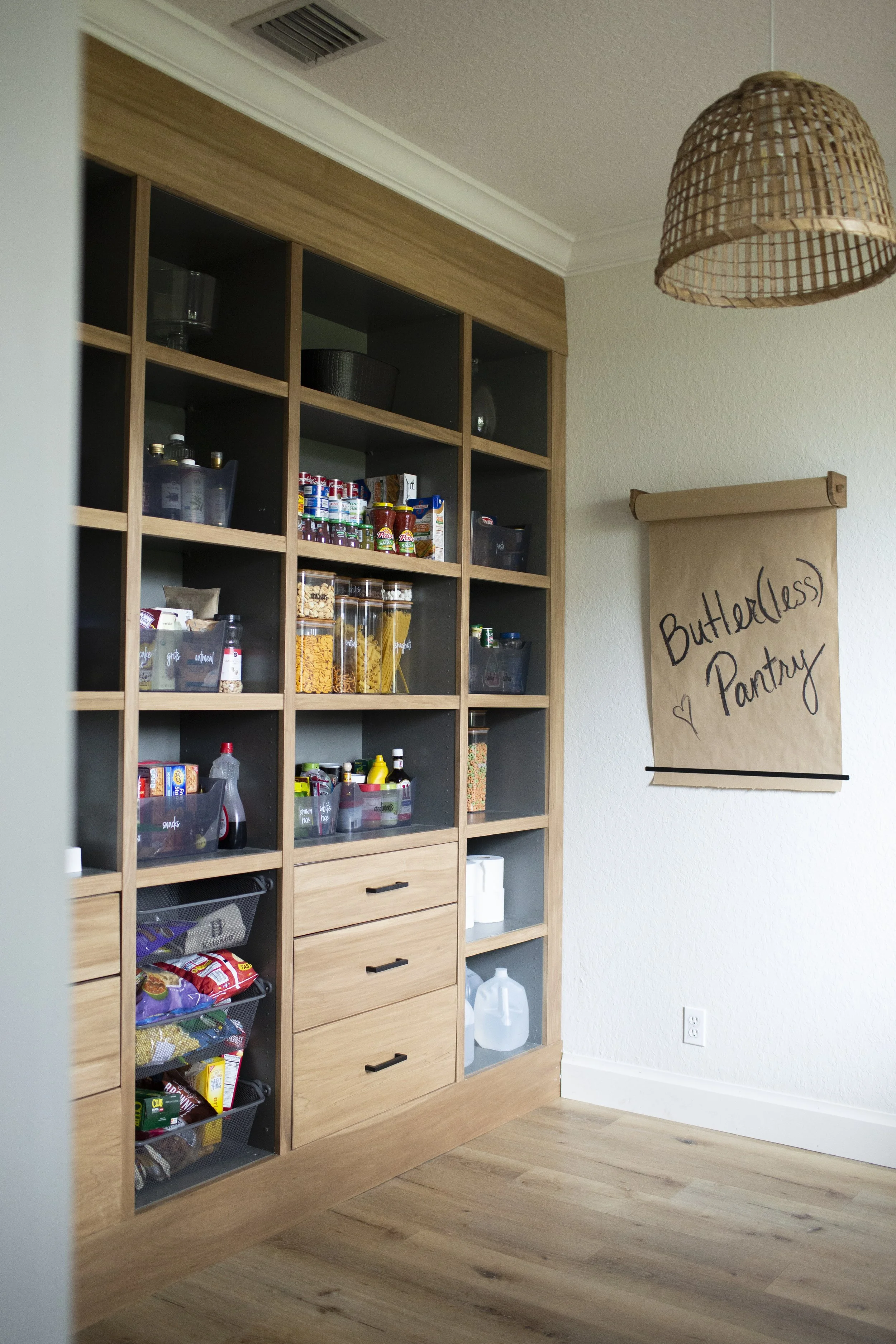 custombuilt-in pantry with wooden shelves fin butlers pantry