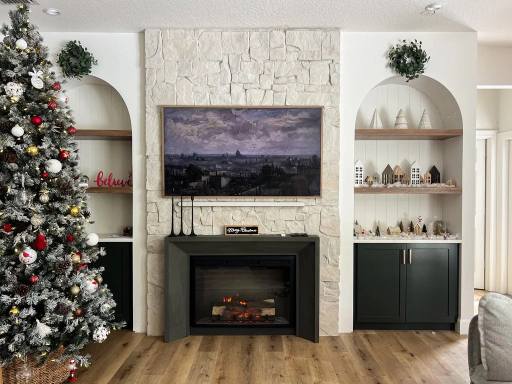 Custom arched Built ins with stone and fireplace. 