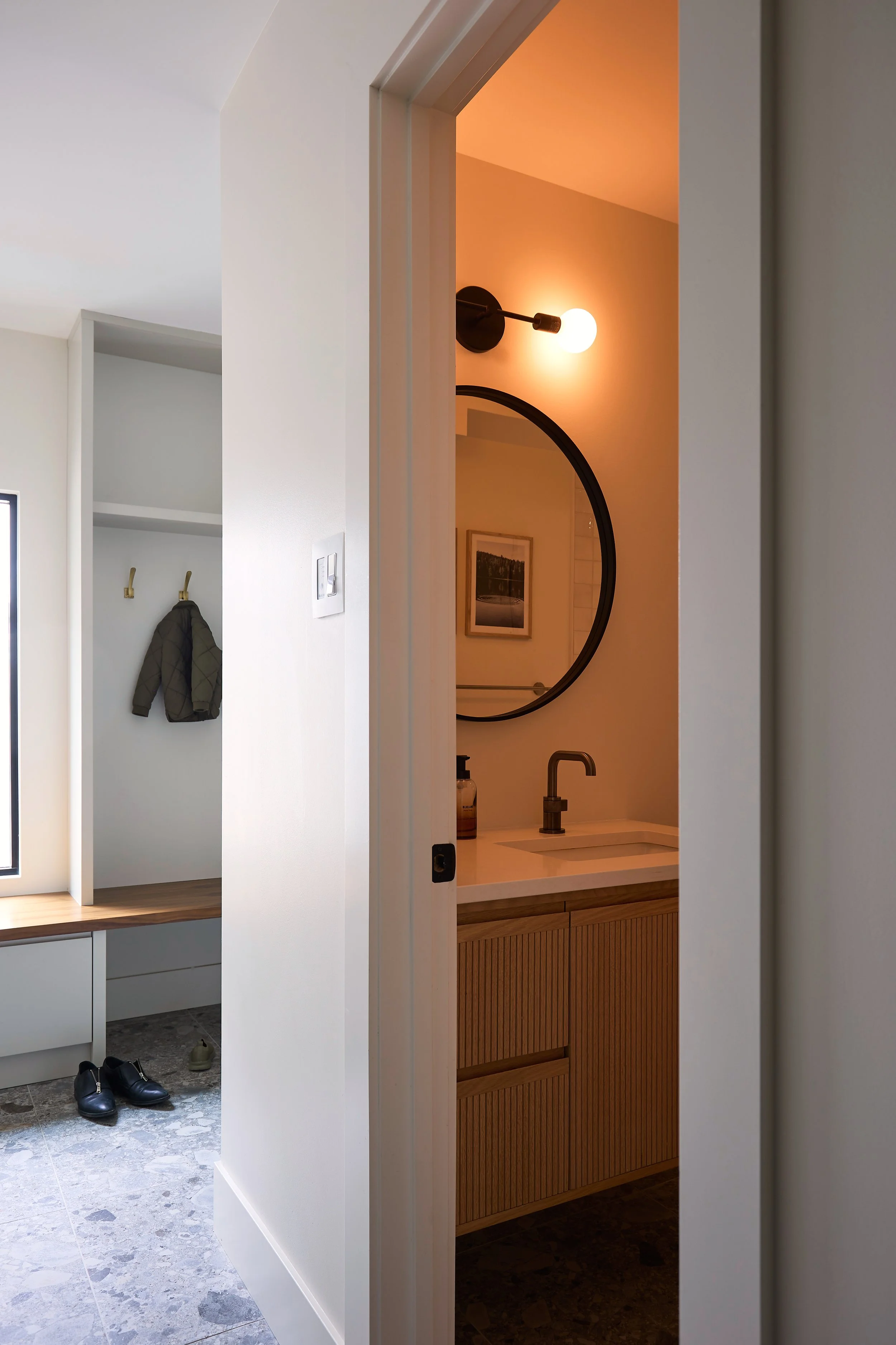 Winnipeg residential mudroom washroom by Canvas Design Studio